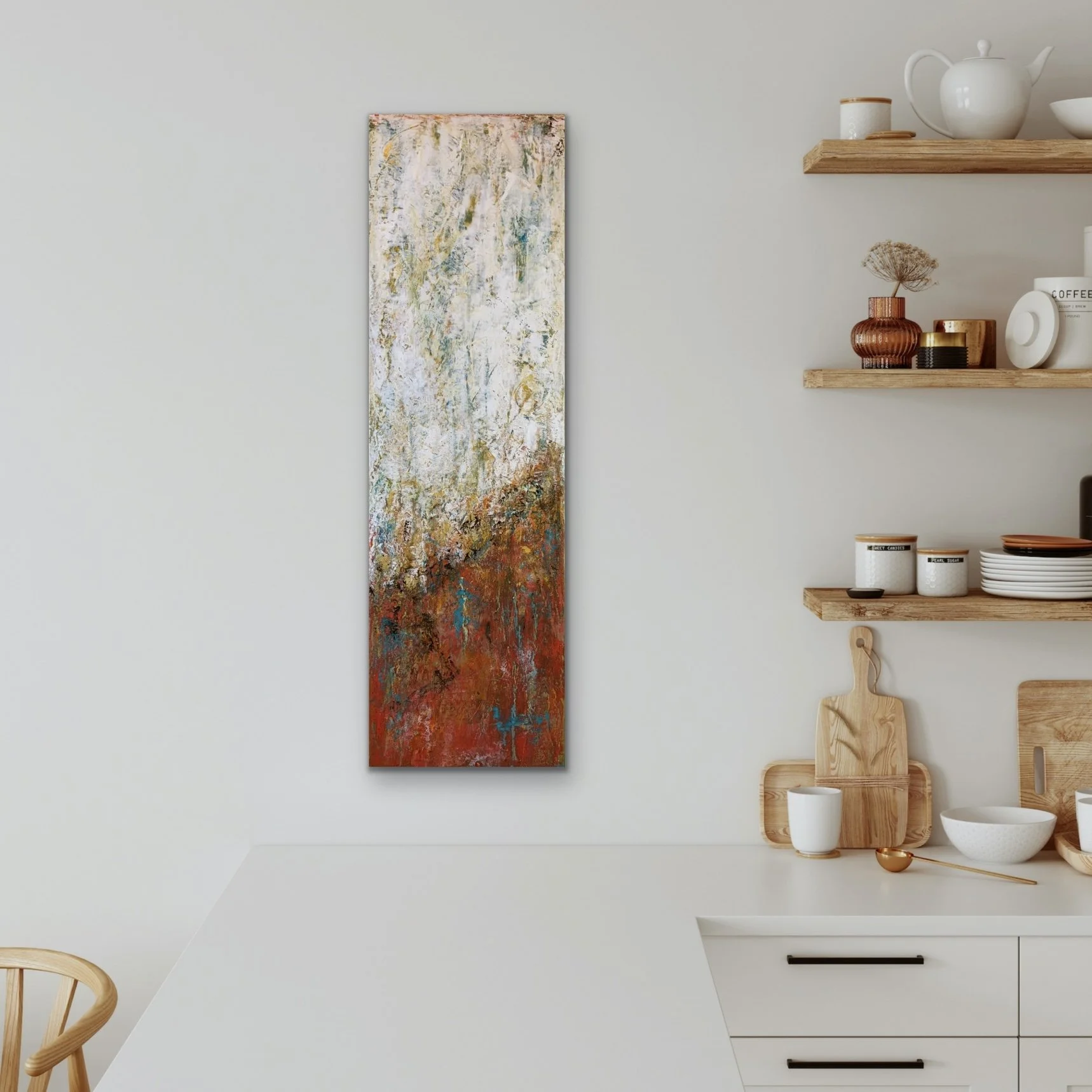 A minimalist kitchen or dining area with white walls and wooden shelves displaying white and neutral-colored dishware. A tall abstract painting with textured, colorful strokes hangs on the wall.