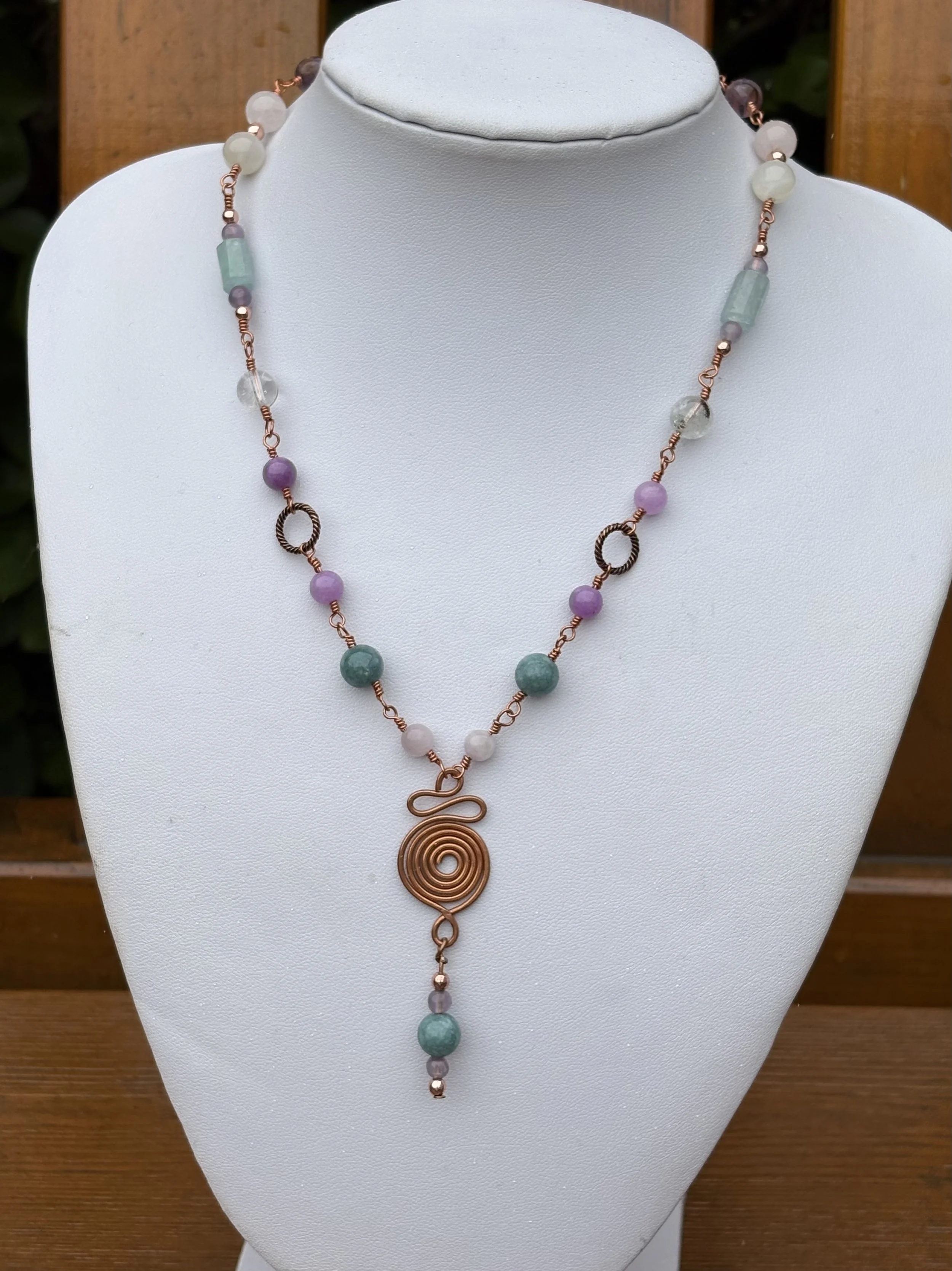 Handmade beaded pendant incorporating semi precious beads