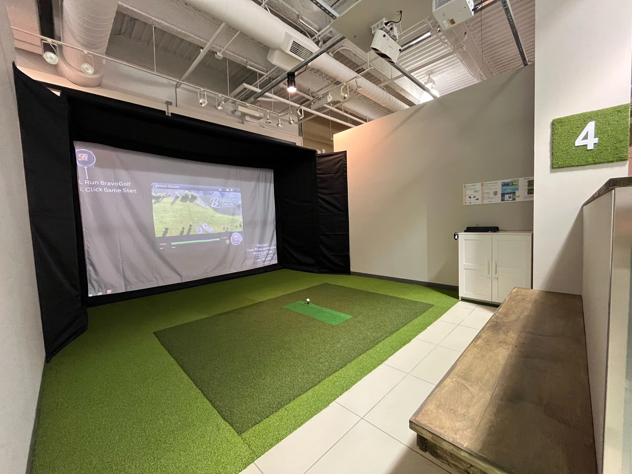 Orby Golf Kitchener indoor golf simulator bay for group events and parties.