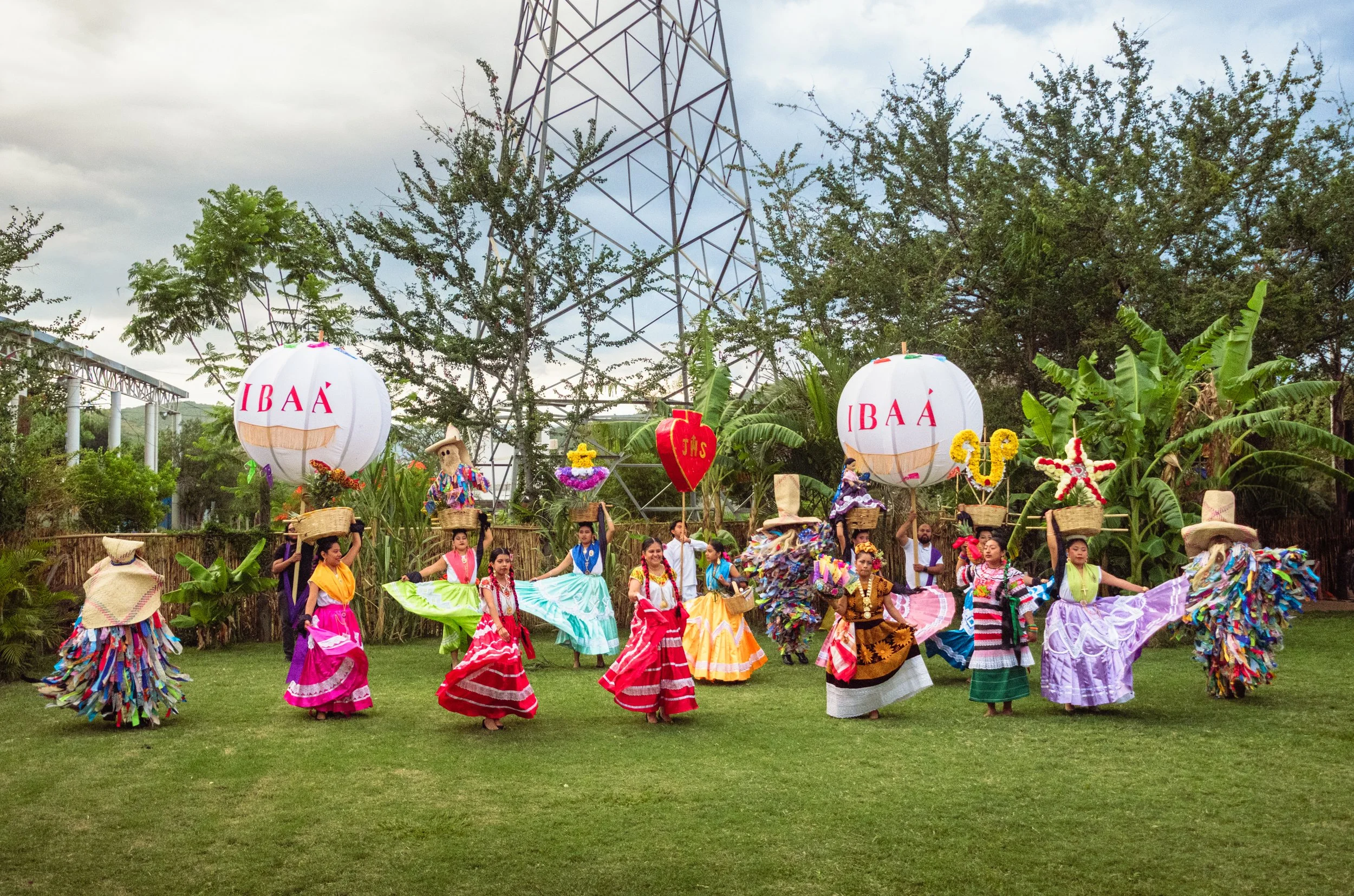 IBAÁ Signature package: premium Oaxacan calenda with full troupe, feather dancer, and drone-documented parade