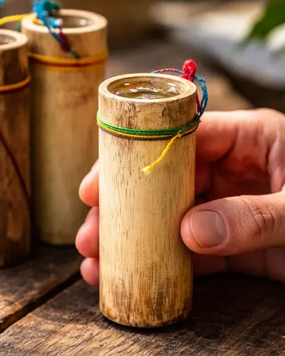 Hand-carved wooden mezcal cup used in traditional Oaxacan calenda celebrations
