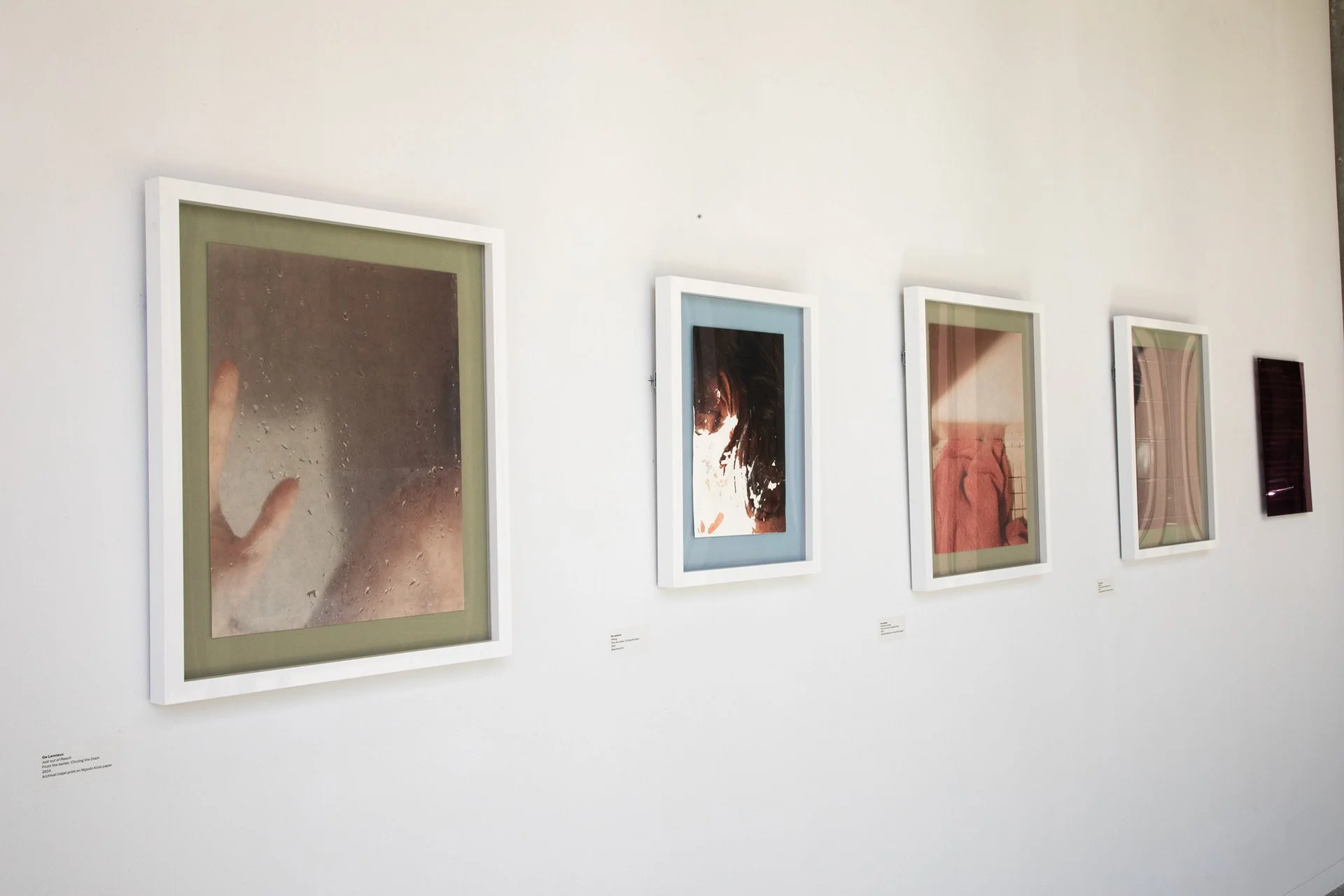 Installation Shot of 3 Hiromi Prints, 1 Bleach Print and the Pink Acrylic Mirror