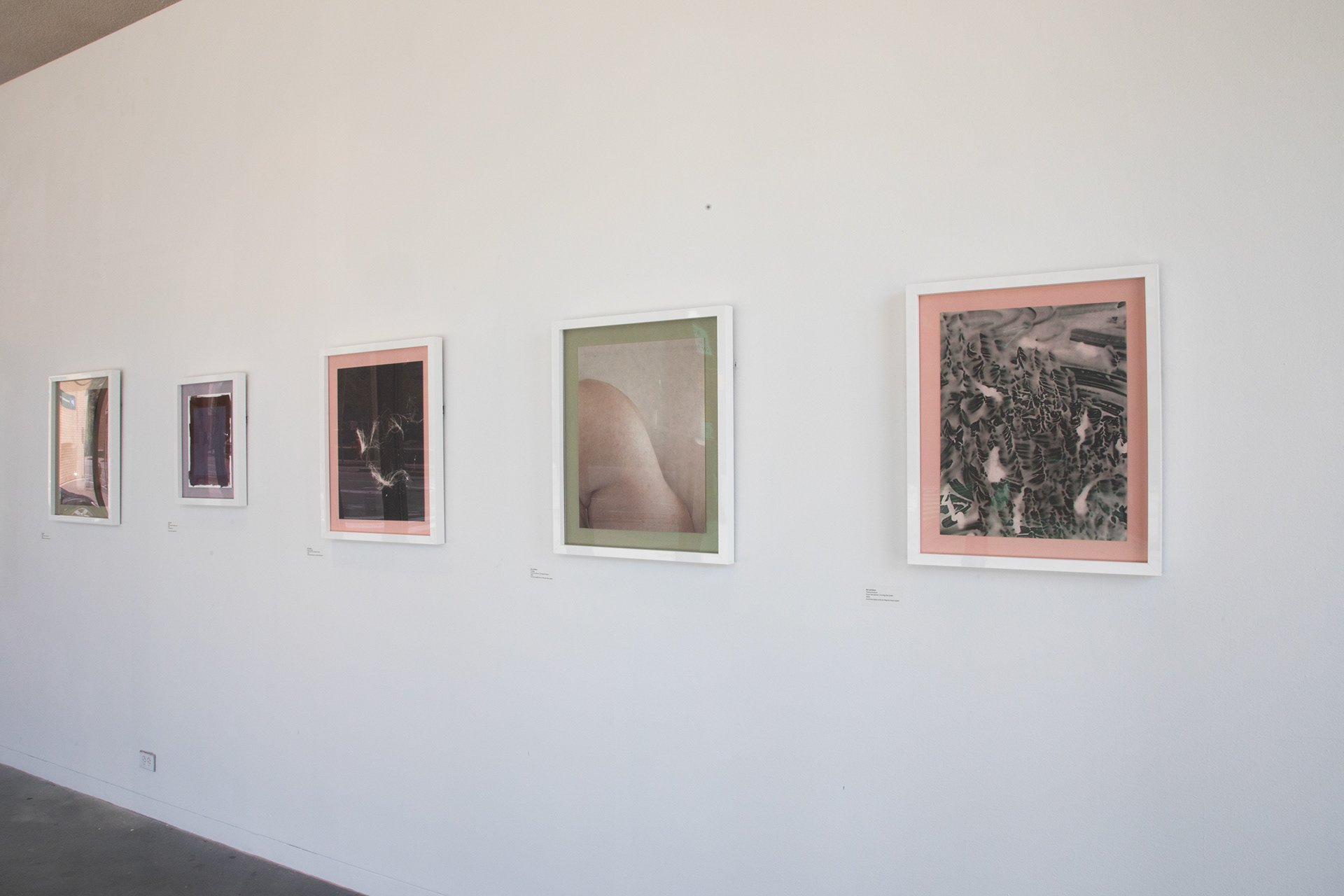 Installation Shot of Wall in Gallery Facing Massachusetts Avenue of the Five Frames on the Wall