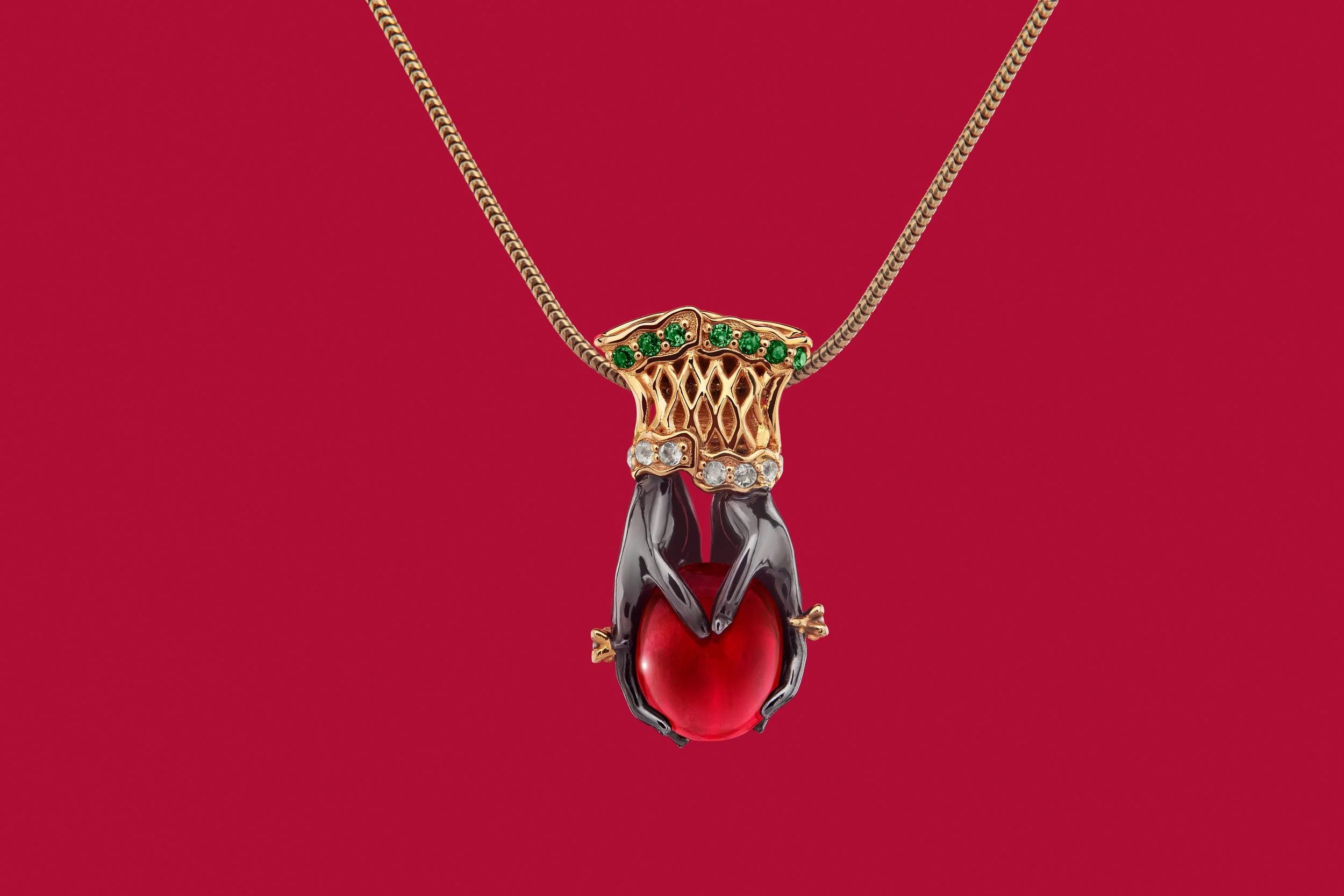 E2J - Hand Pendant Holding a Gemstone