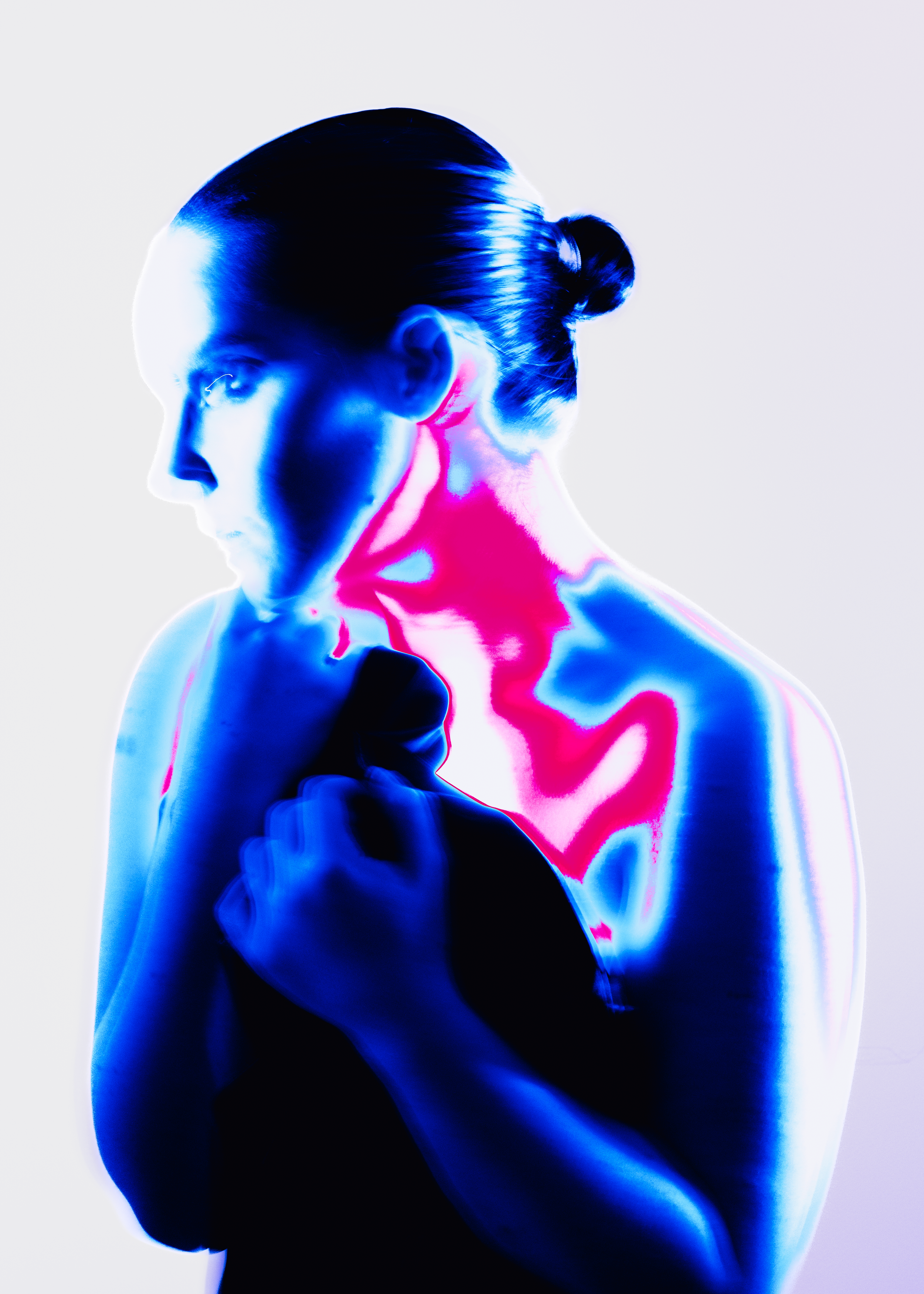 A stylized digital art of a woman in profile with her hair in a bun, rendered in bright blue, pink, and purple hues against a light background.