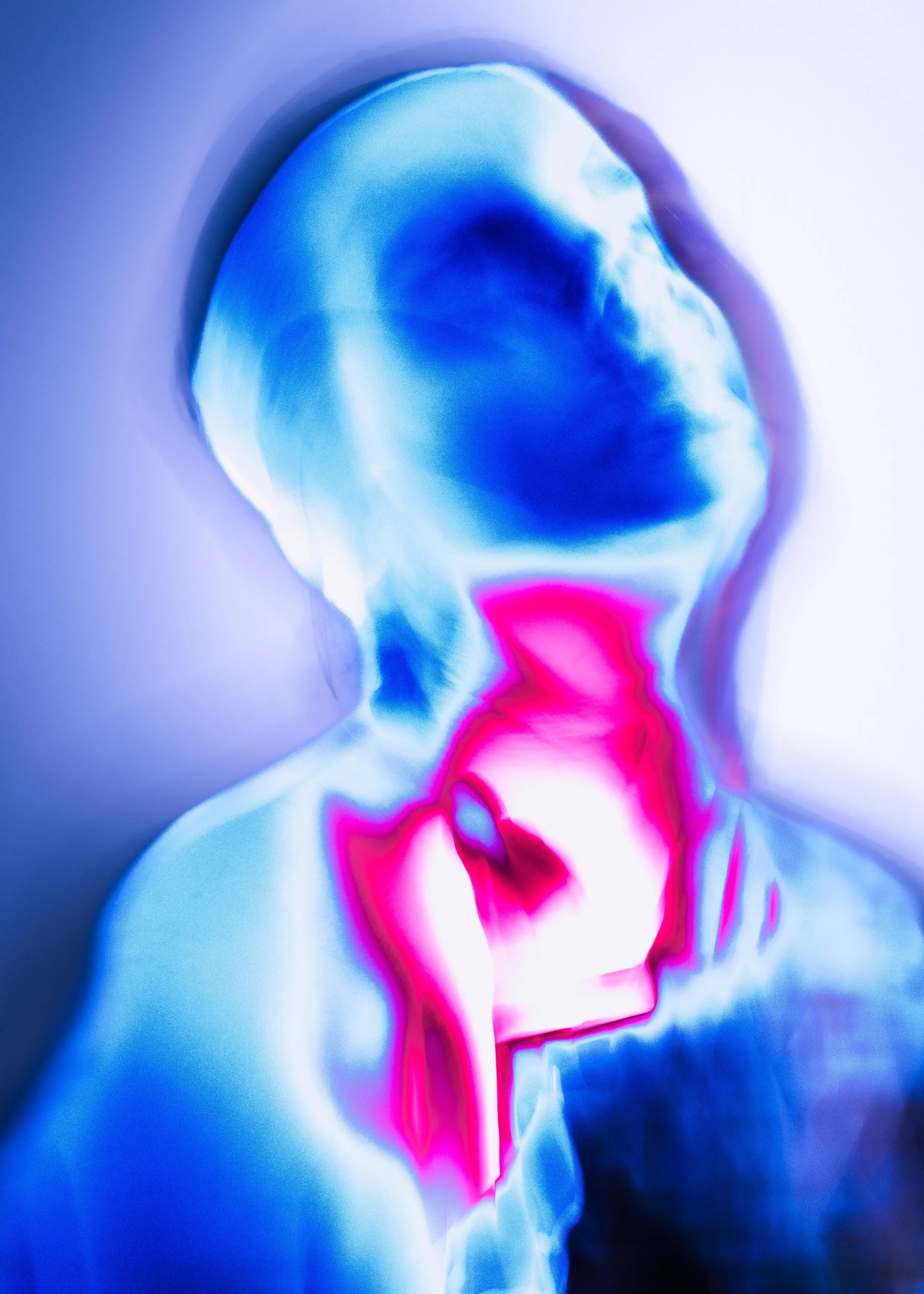 Abstract digital artwork with bright pink, blue, and purple color swirls.
