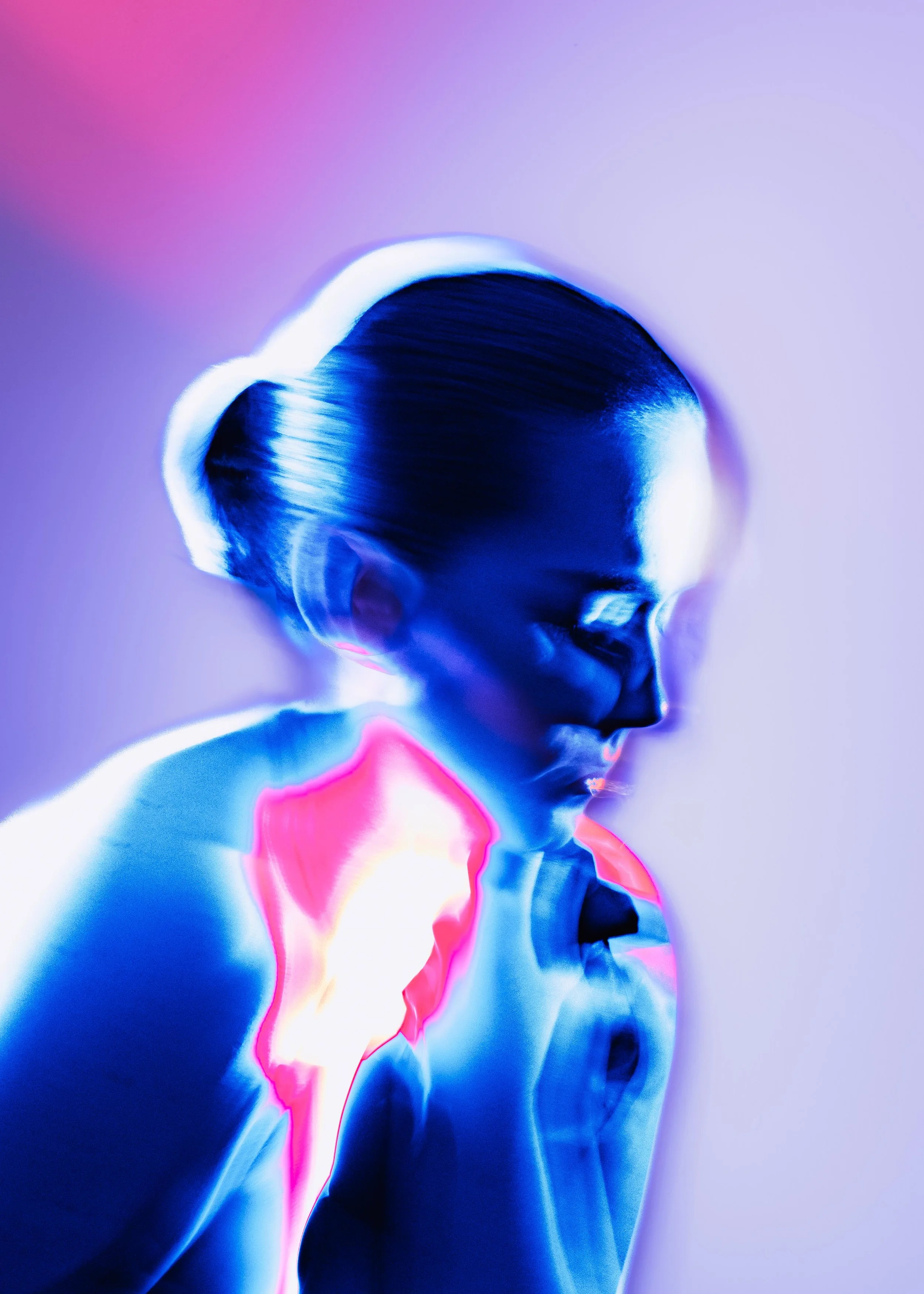 Abstract digital art with vibrant neon colors in shades of blue, pink, and purple, creating a flowing, dynamic pattern.