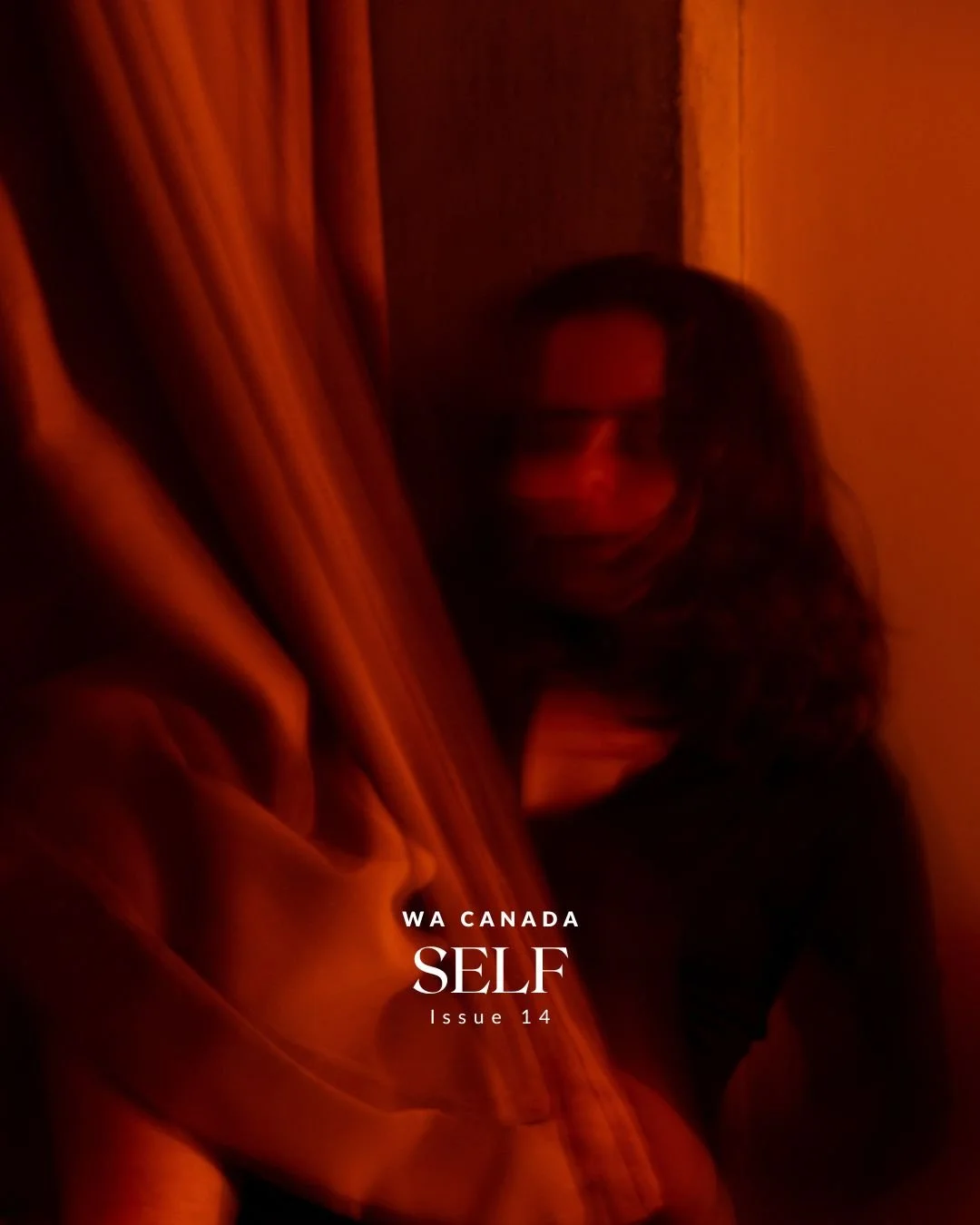 A woman with curly hair and sunglasses peeking from behind a curtain in a dimly lit room with orange-red lighting, with text overlay reading "WA CANADA SELF Issue 14."