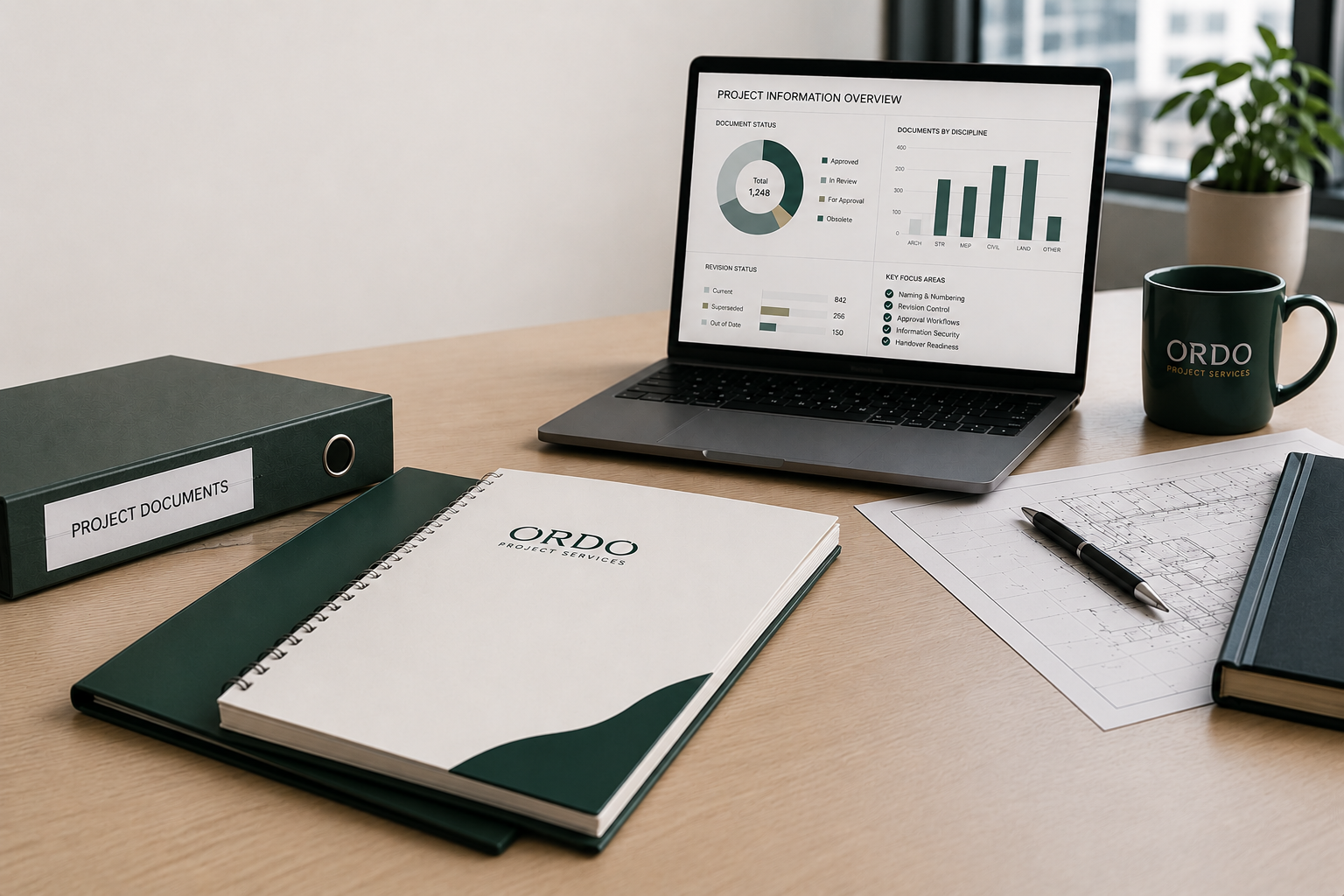 Office desk with documents labeled 'Project Documents', a laptop displaying project data charts, a planner with 'ORDE' on the cover, a pen, a printed architectural plan, a green coffee mug with 'ORDO Project Services', and a potted plant near a window.