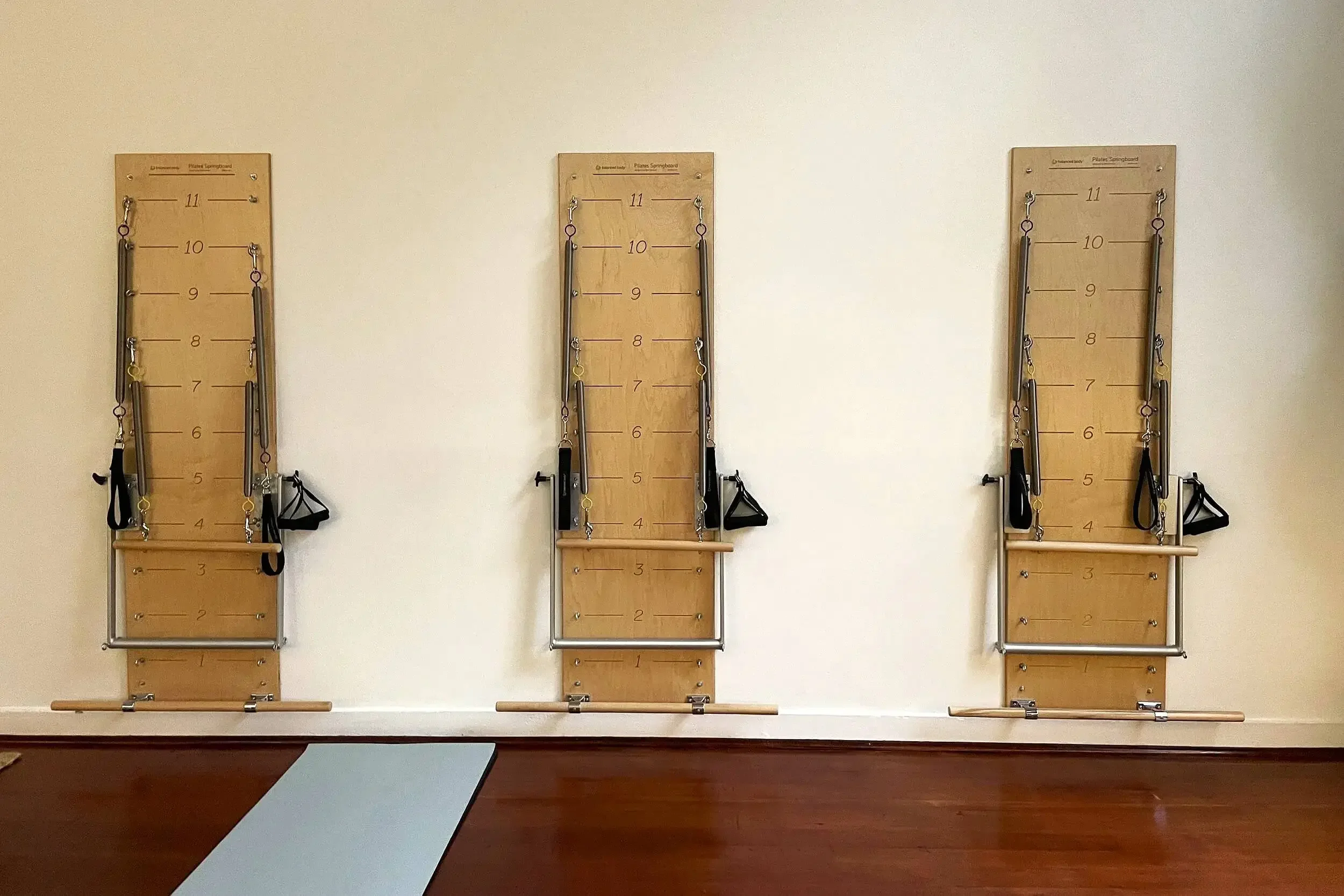 Three wall-mounted Springboards in the Pilates Incorporated studio in Amsterdam West