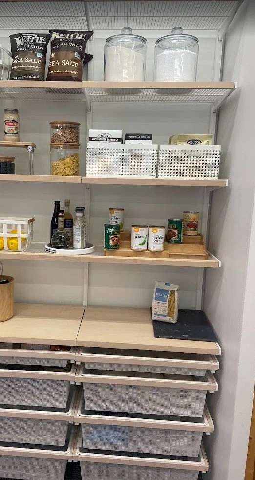 vertical pantry storage with elf pullout drawers in a kitchen with neutral colors in The Woodlands, TX