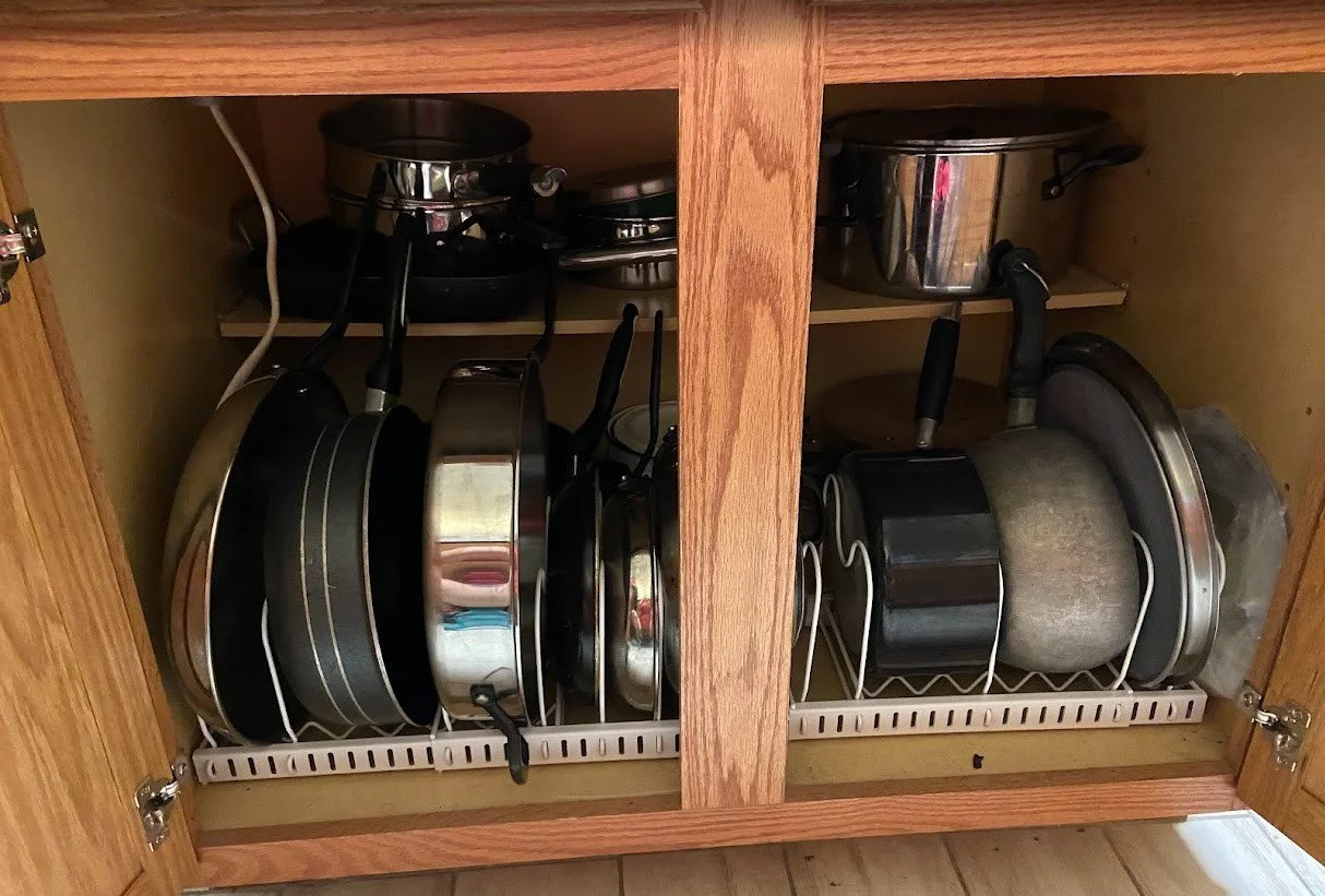 under the island pot and pan storage lid organization rack that is adjustable