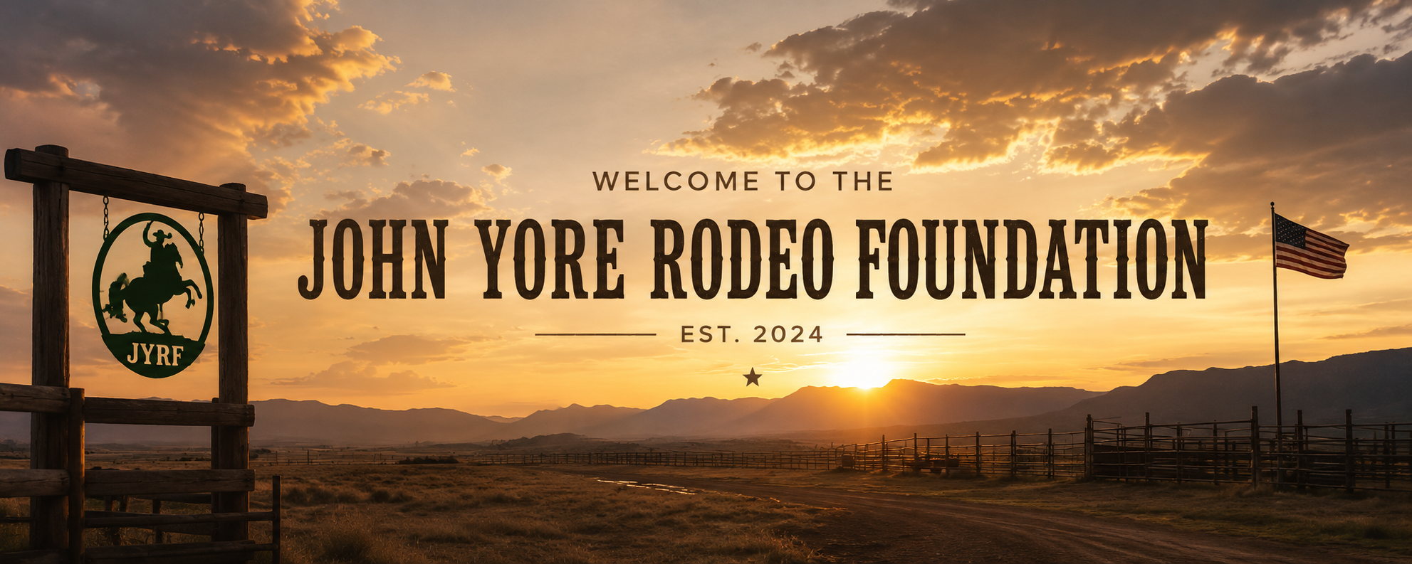 Sunset over a ranch with a sign for the John Yore Rodeo Foundation and an American flag in the background.