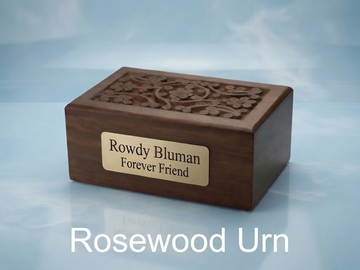 A wooden urn with a carved top and a plaque that reads 'Rowdy Bluman Forever Friend'