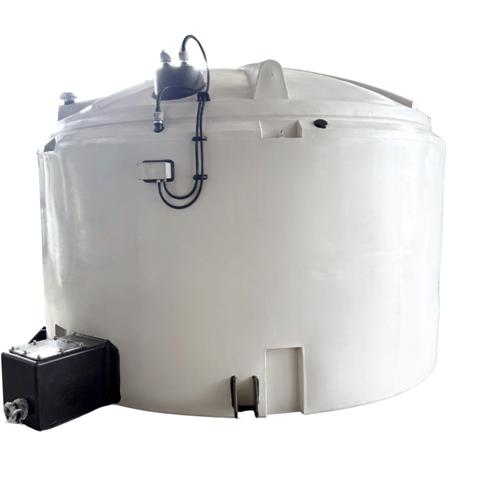 A large, white, cylindrical industrial storage tank with pipes and a control box attached.