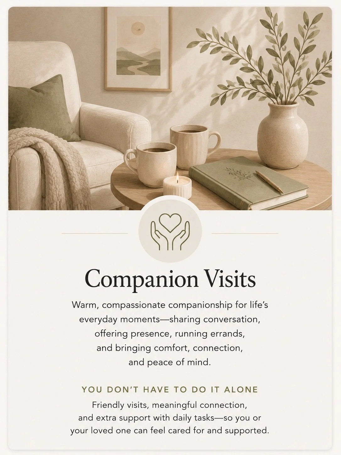 A cozy living room corner with a white sofa, a beige throw blanket, and a cushion. A wooden coffee table with two coffee mugs, a lit candle, a book with a leaf illustration, and a pen. A large vase with leafy branches stands on the table. A framed landscape picture hangs on the wall.