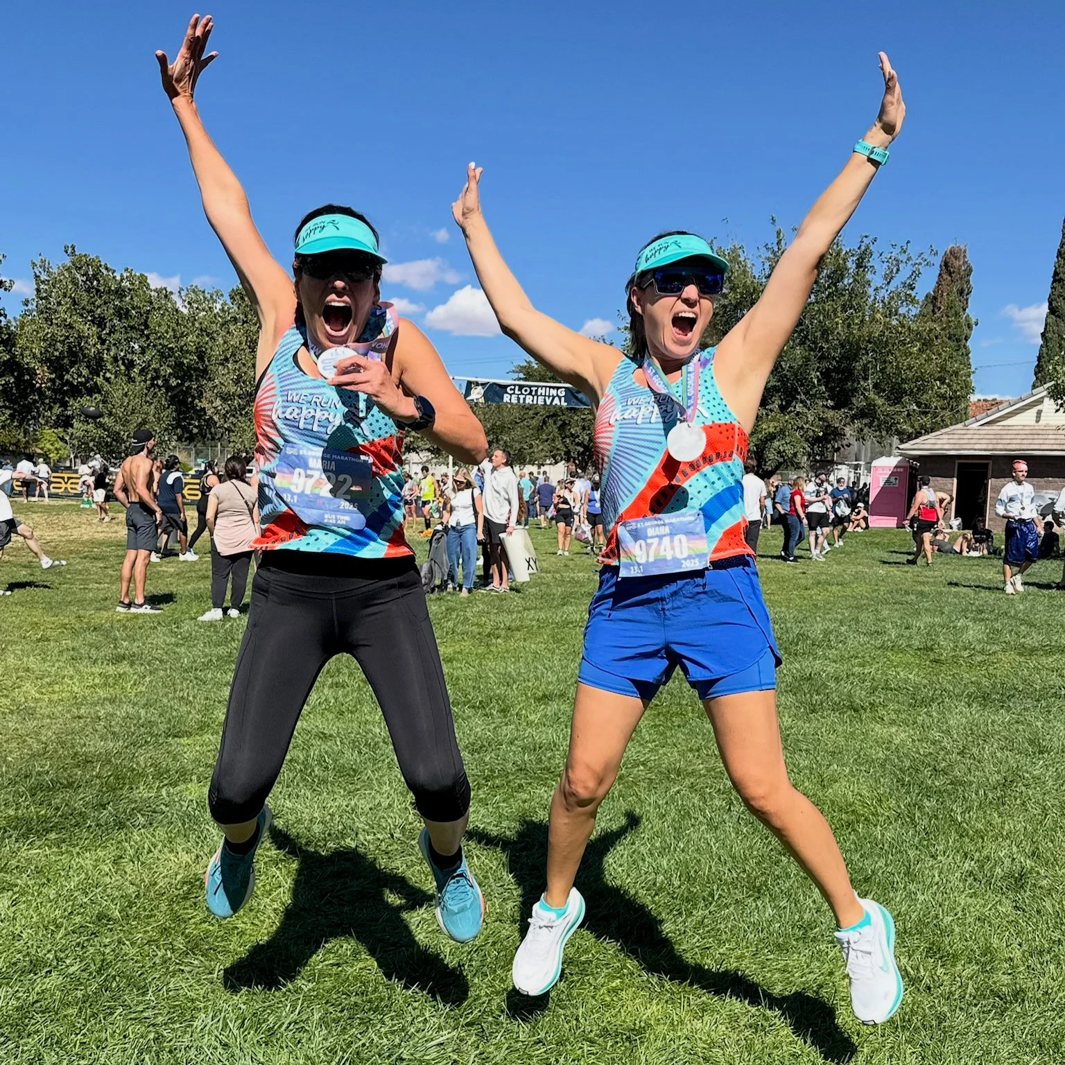 Runners celebrating after a marathon with LATAM Marathon Experience group travel program. Contact LATAM Marathon Experience for marathon travel packages, race experiences, and group running trips.