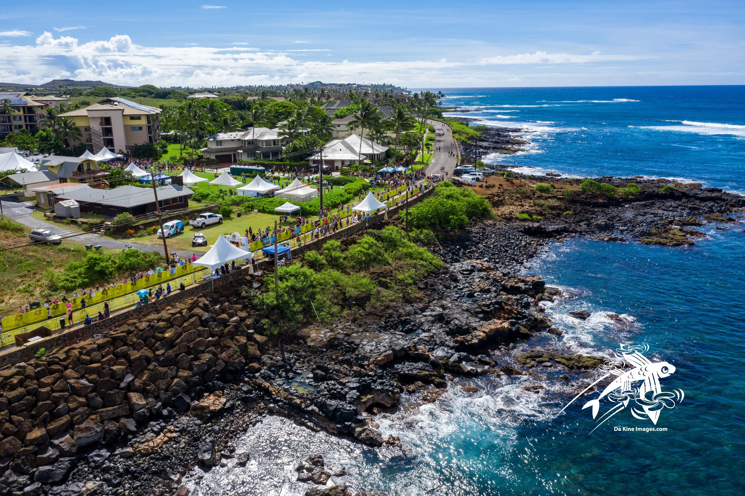 Aerial view of the Kauai Marathon start and finish area in Poipu, Hawaii, showcasing one of the world’s most scenic marathon destinations and a signature LATAM Marathon Experience event.