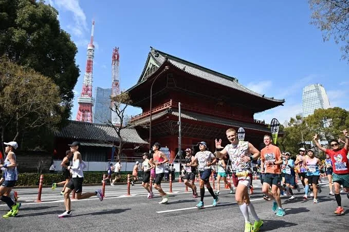 Runners participating in the Tokyo Marathon, one of the Abbott World Marathon Majors, experiencing the unique blend of Japanese culture and world-class marathon racing.