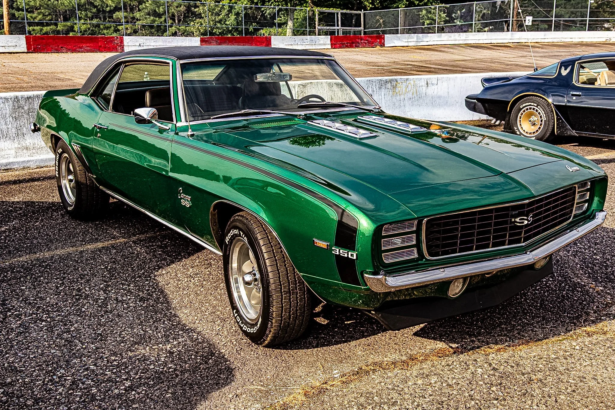 I still remember standing by the track, looking at that gorgeous, green classic Chevrolet Camero.