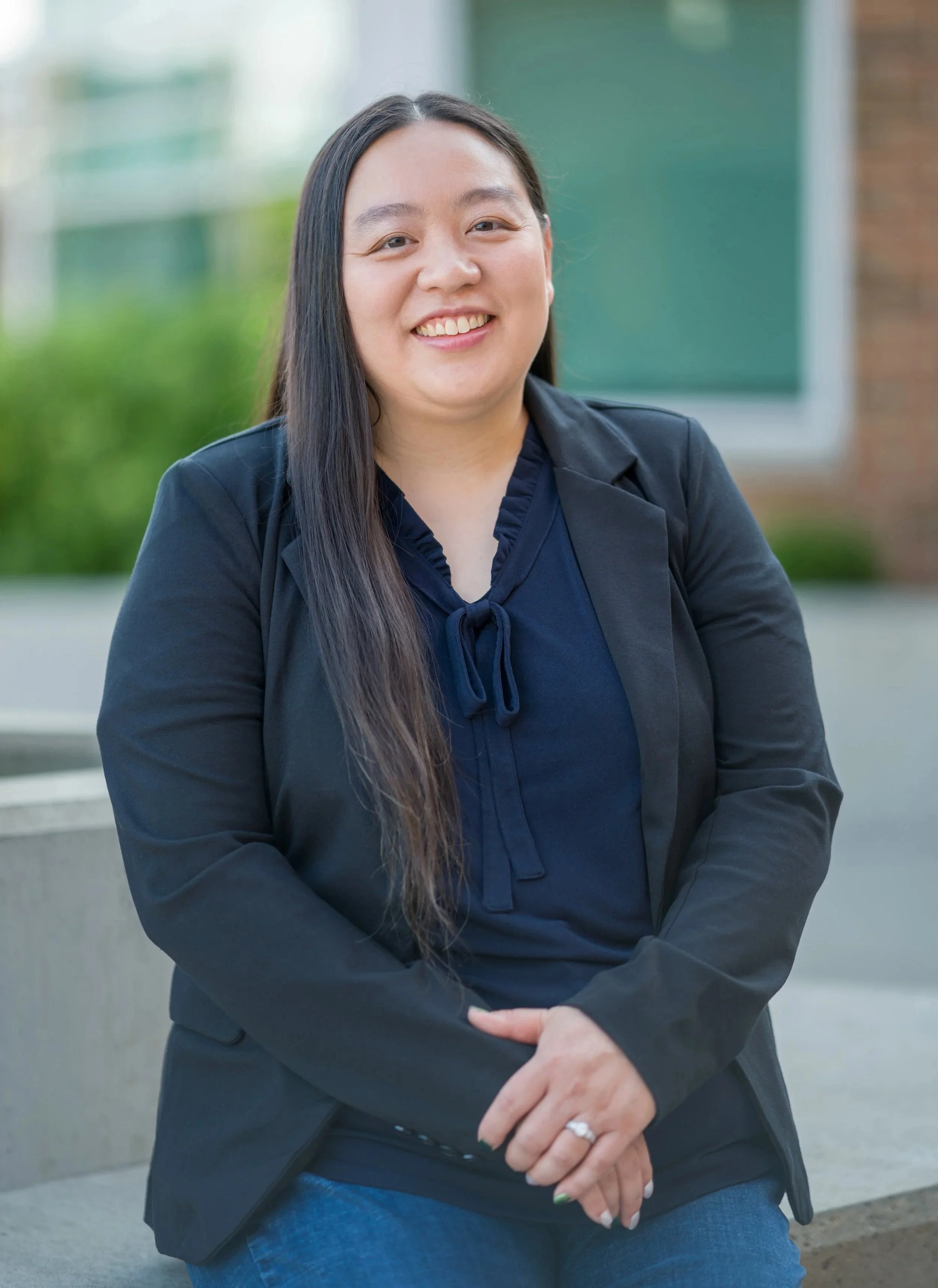 Portrait headshot of Dr. Cassie Lopez-Jeng, running for Novi School Board