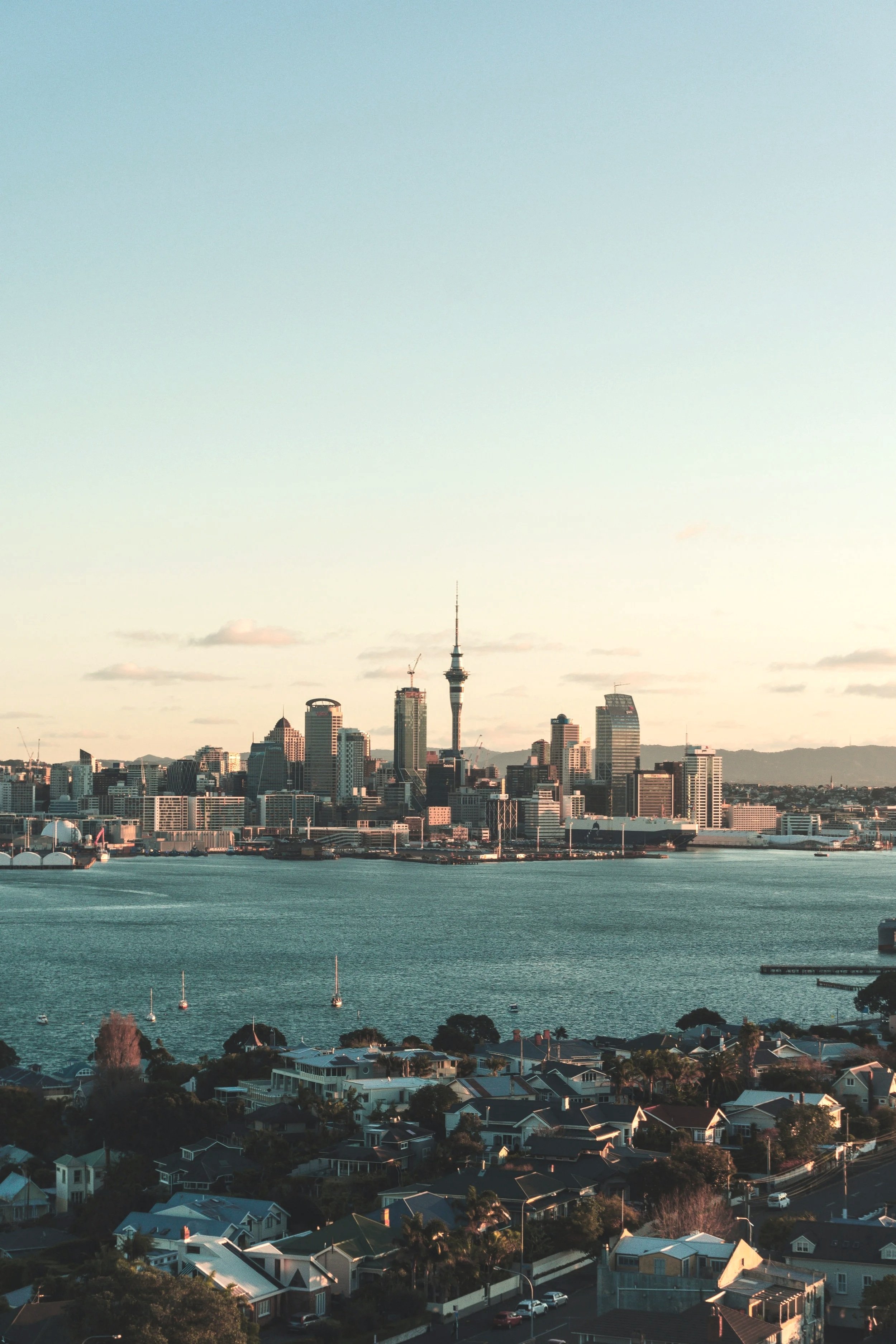 Auckland city skyline viewed across the harbour, the location served by Astro Property Management