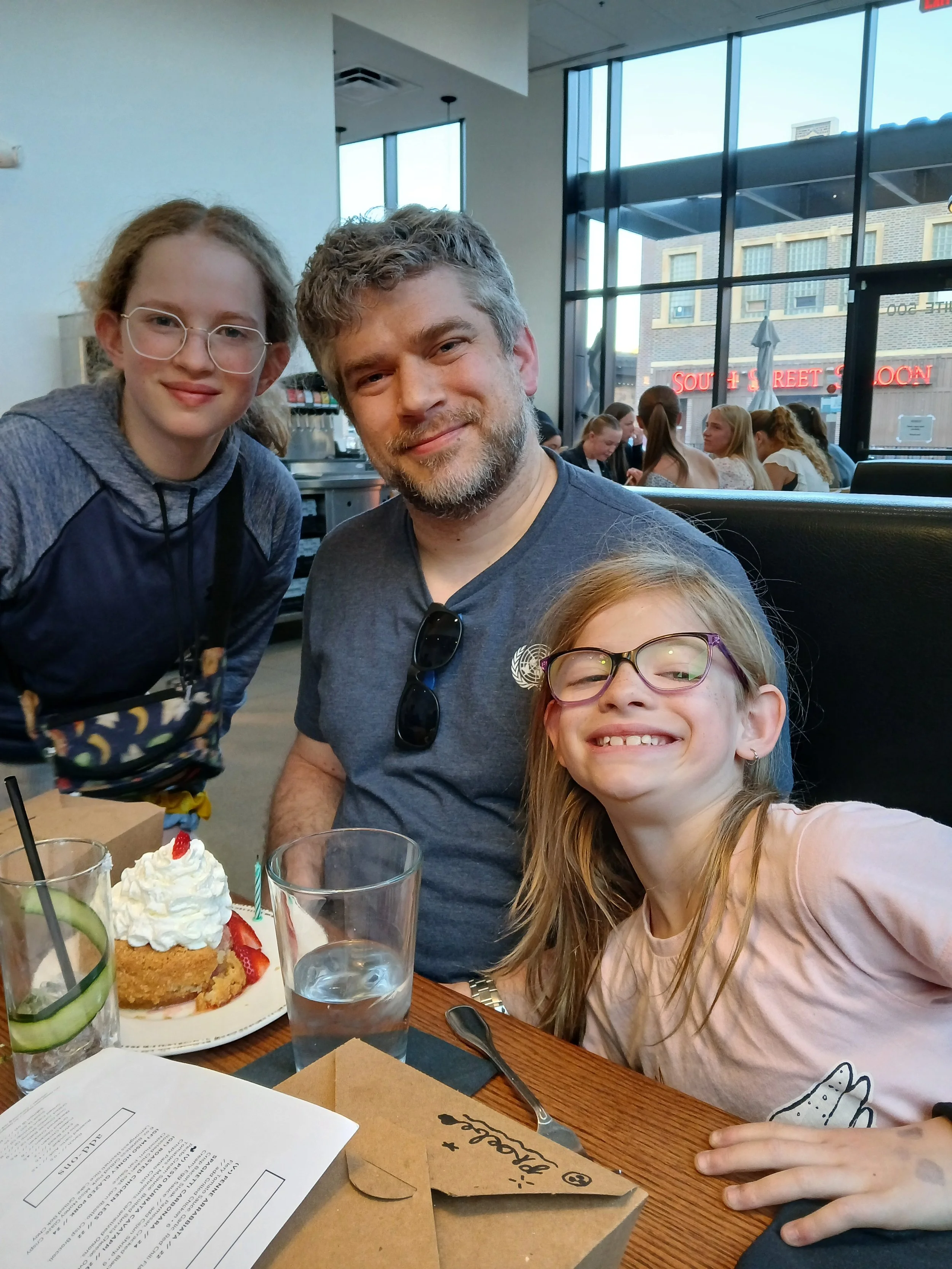 Benton and his daughters at a local restaurant