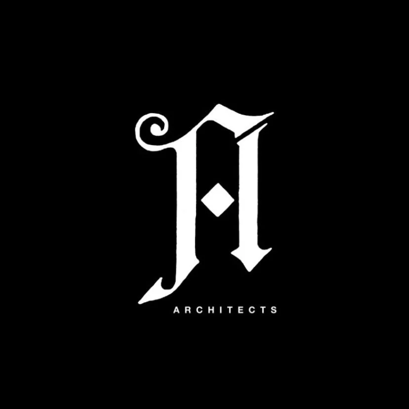 A black background with a white stylized letter 'J' and the word 'ARCHITECTS' underneath.