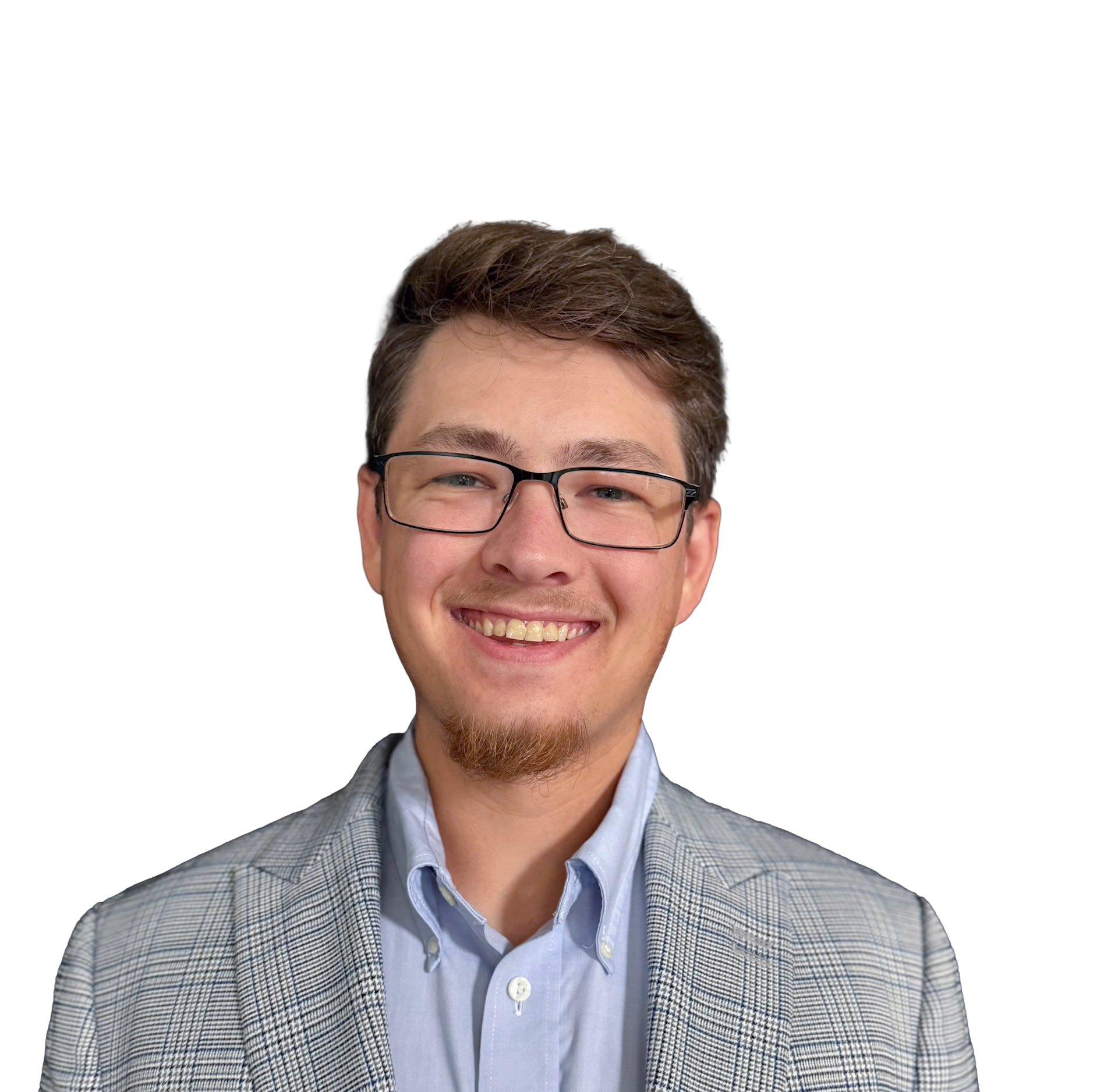 Portrait of a smiling man with brown hair, glasses, wearing a checkered blazer and light blue shirt, against a white background.
