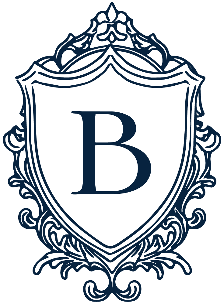 Illustration of a decorative shield with the letter 'B' in the center.