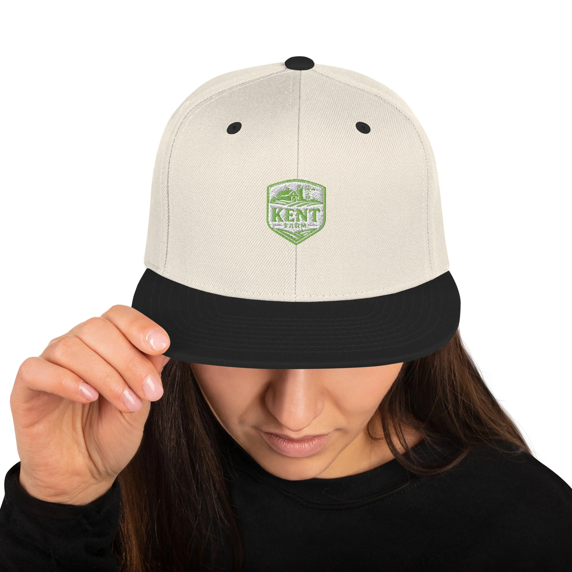 Green Kent Farm shield snapback cap with gold embroidery.
