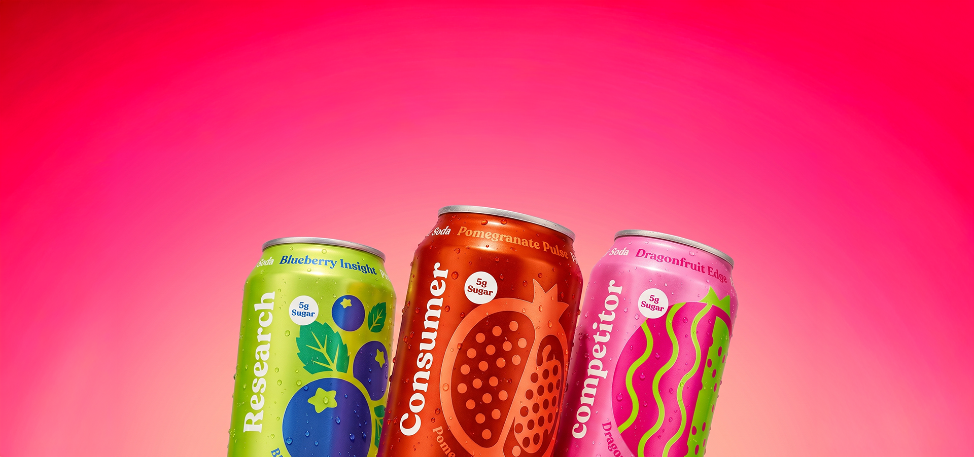 Three cans of flavored soda with fruit-themed designs on a pink background.