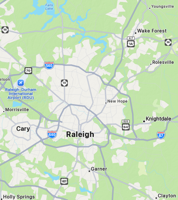 Map of Raleigh, North Carolina, with nearby cities and major highways, including Raleigh-Durham International Airport.
