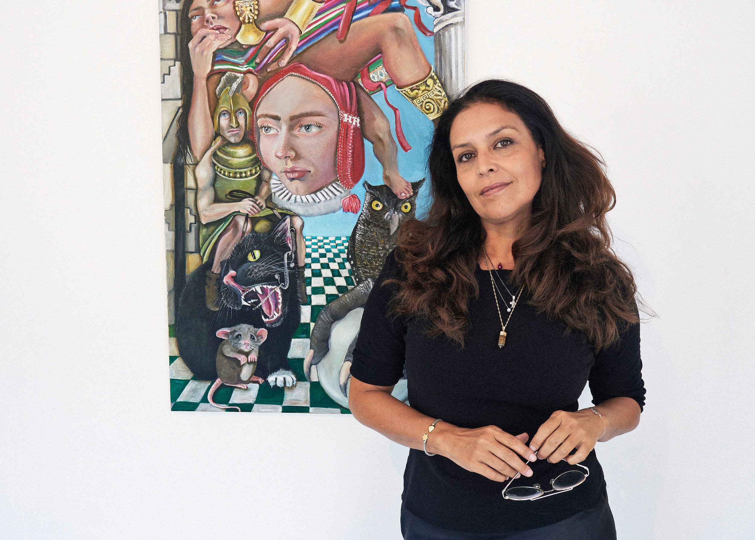 The portrait of the visual artist HUAIKA REALE, at her back the original artwork created entirely by hand in my studio. Through a visionary figurative language, she explore themes of human consciousness, mythology, nature, and spirituality.