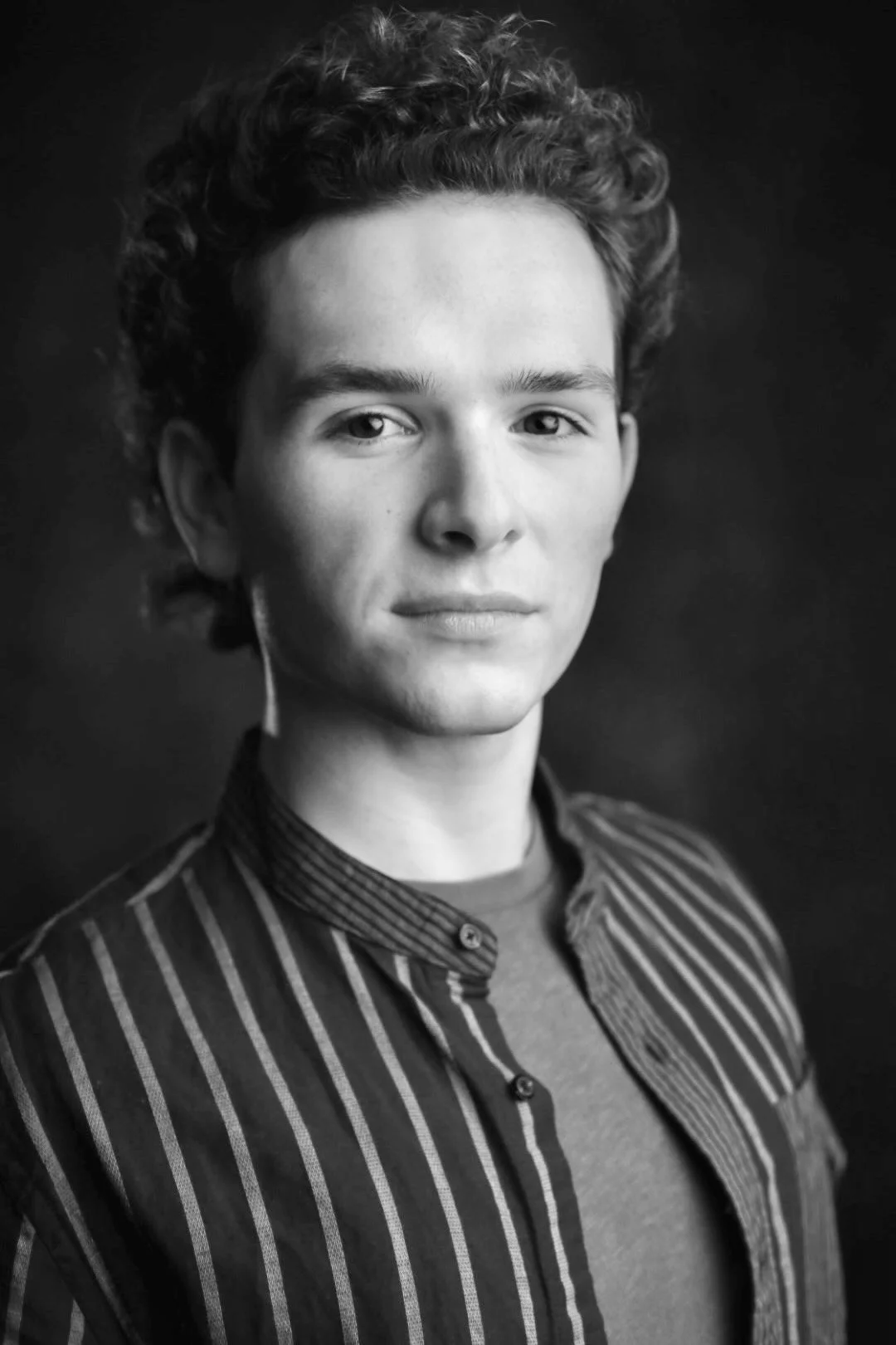 Burke Brickner, multifaceted performing artist (Black & White Headshot by Kevin Ludwig) (2025)