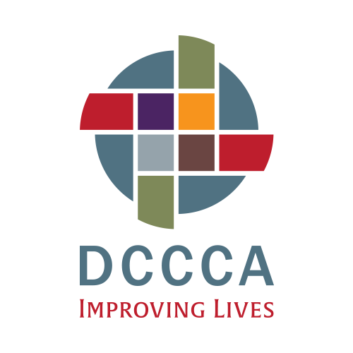 Logo with a circular design made of colored rectangles and squares, with the text 'DCCCA' below and 'IMPROVING LIVES' underneath.
