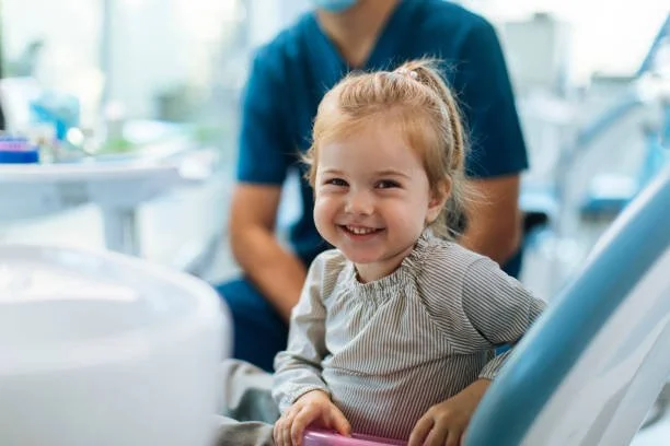Female patient in dental chair during an exam visit in Taylor Dentistry, Omaha, NE.