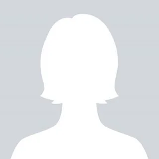 Silhouette of a person's head and shoulders against a light gray background