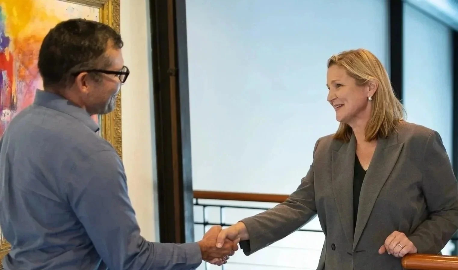 Amanda Bielawski collaborating with a team of strategists