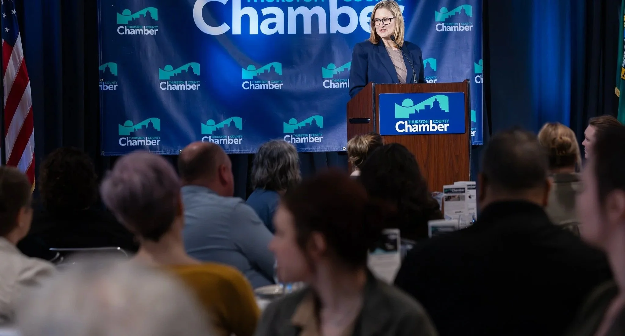 Amanda Bielawski delivering a keynote to business and community leaders