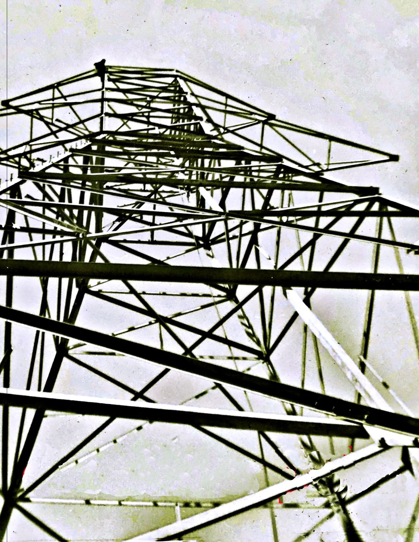 Ralph lineman atop tower Kitimat-Kemano tranmisson line, 1952