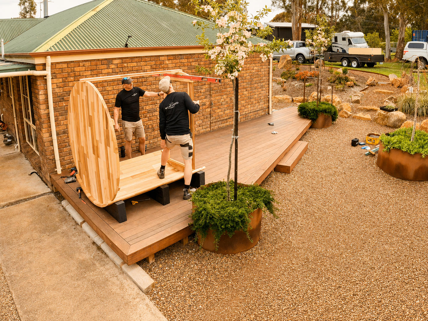 people building a sauna on a deck