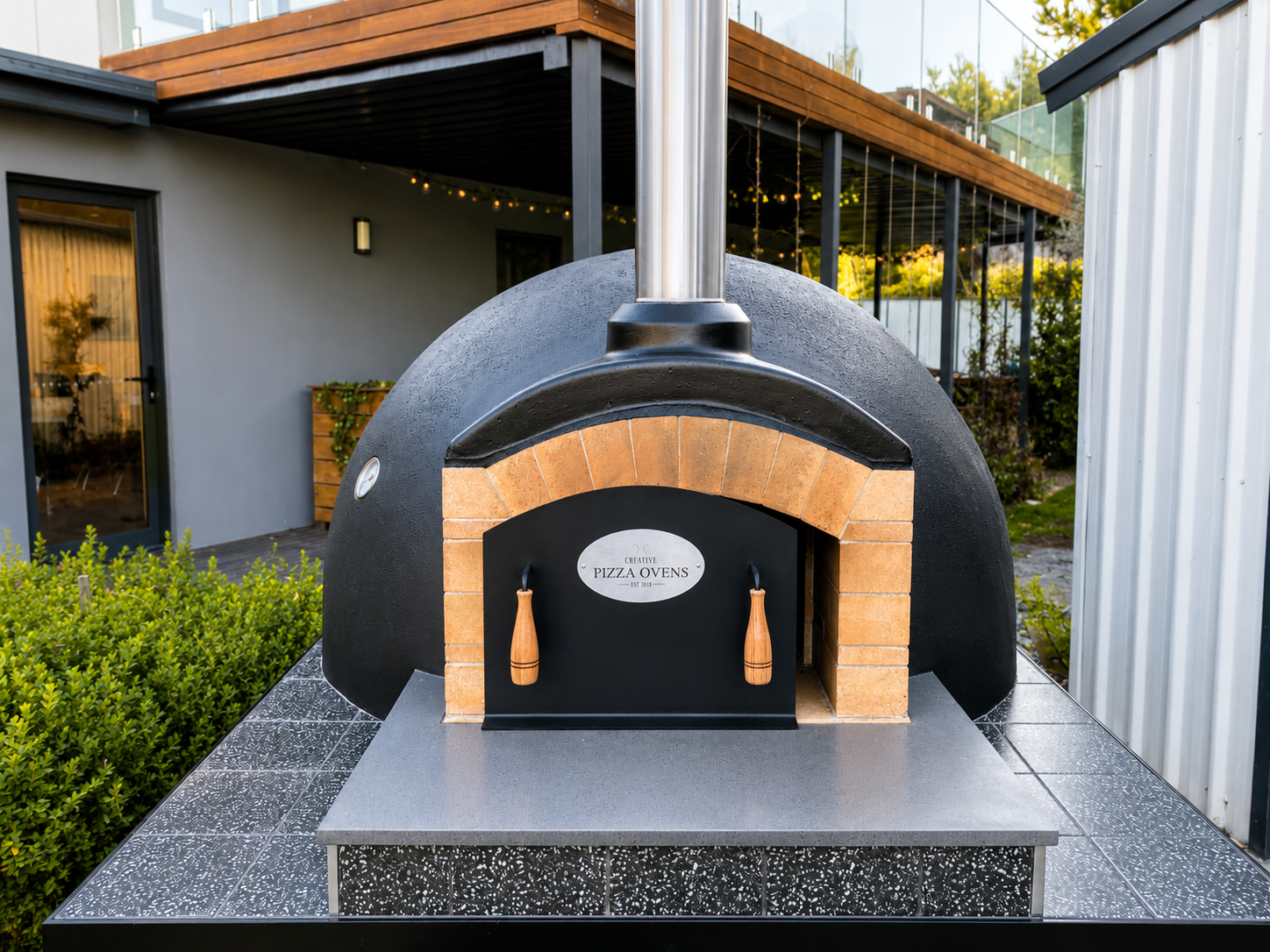 Pizza Oven in front of a home
