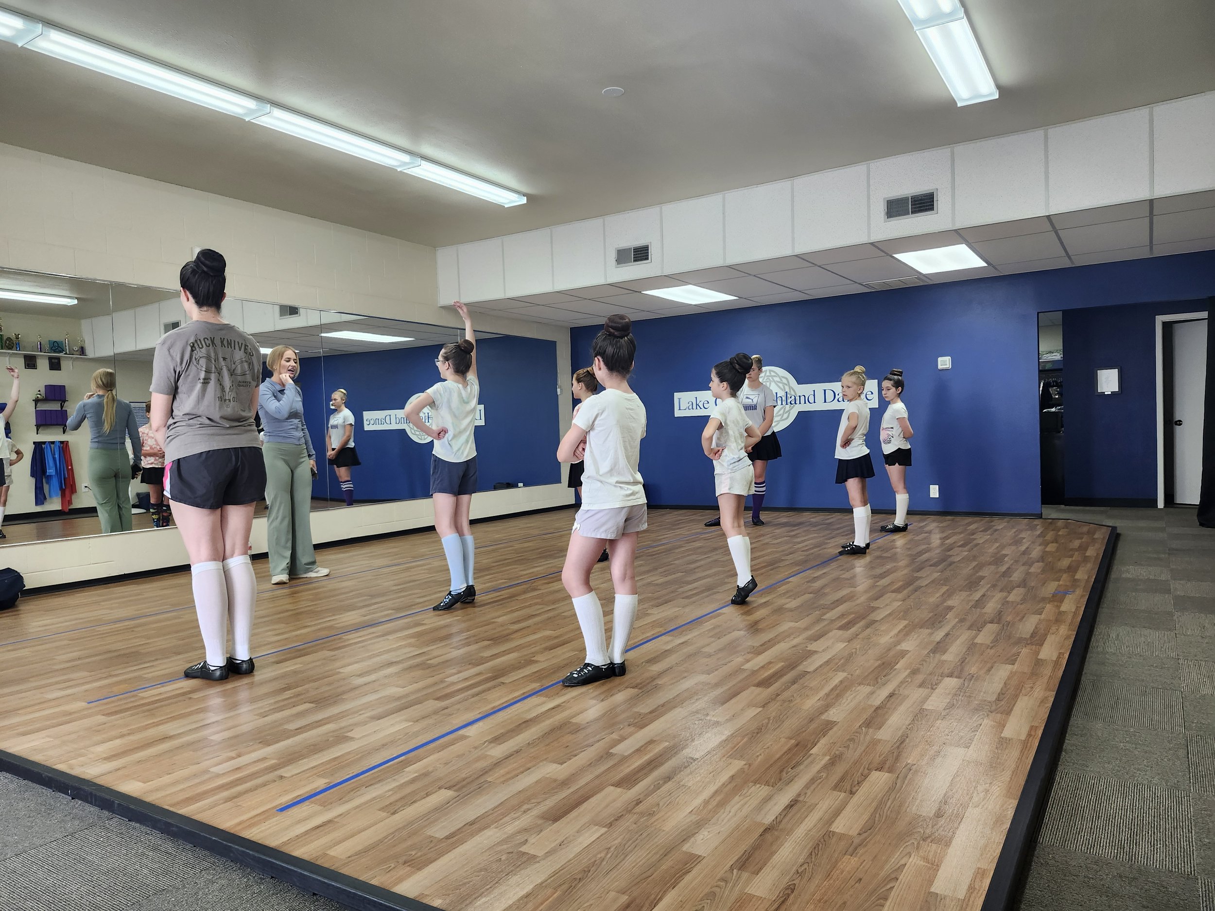 Dancers in a studio practicing traditional Scottish Highland Dancing.