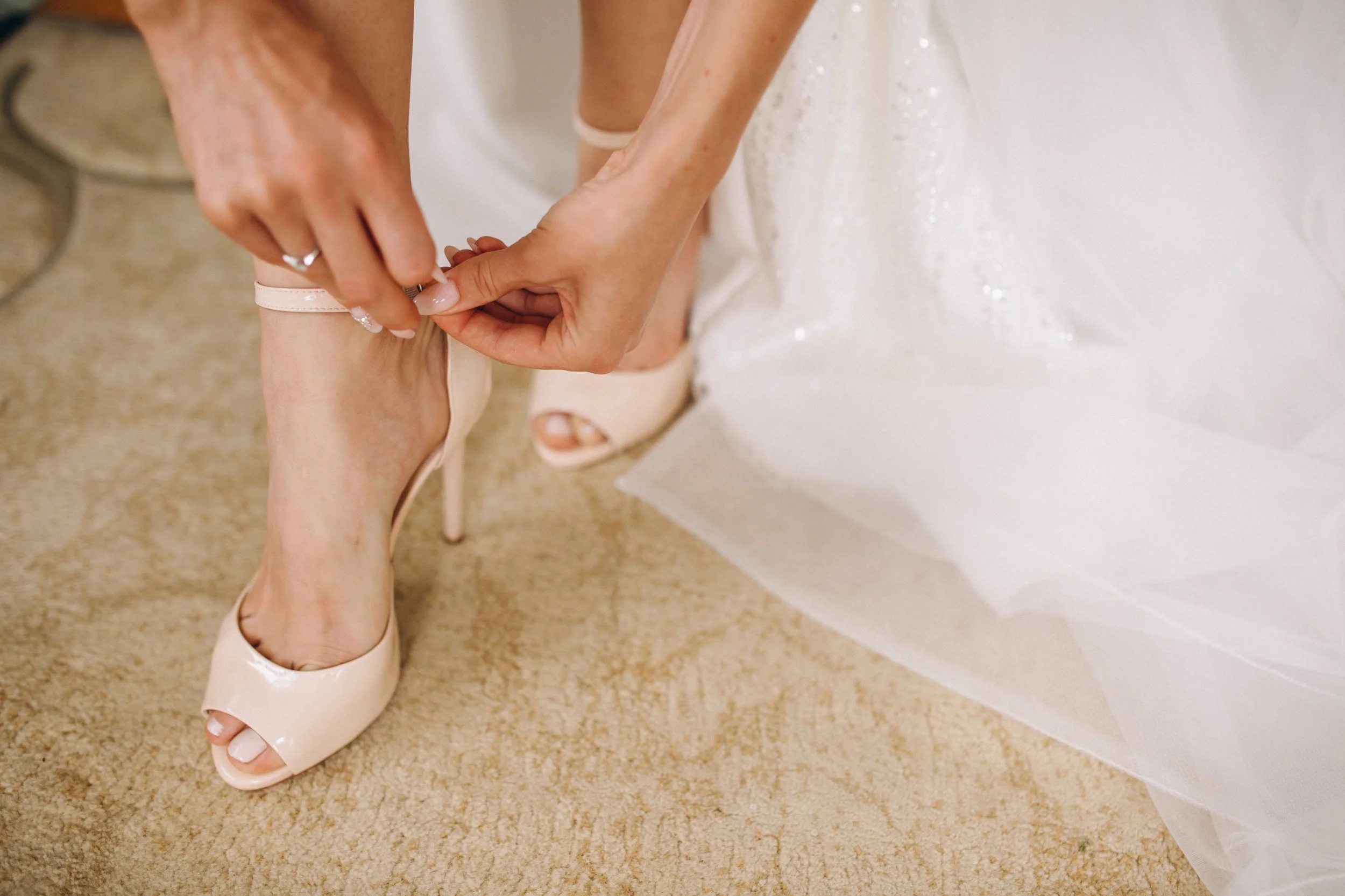 female-wedding-shoes-close-up.jpg