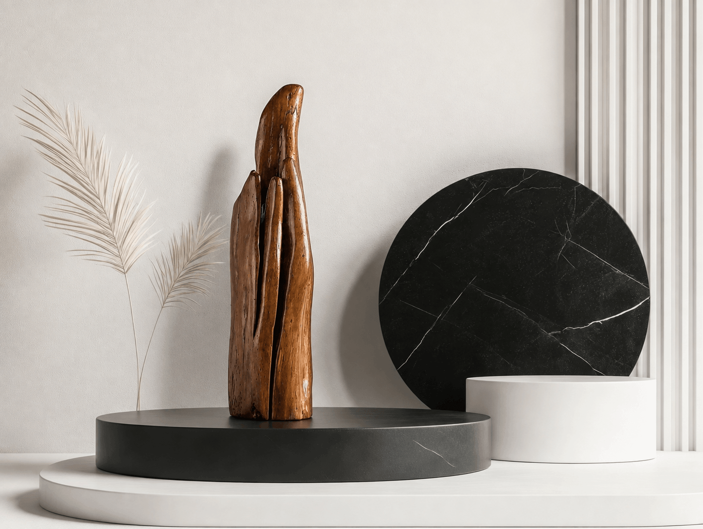 Southern Pod 53cm hand-carved fine art timber sculpture by Ole Jensen displayed on a black round pedestal in a modern studio setting.
