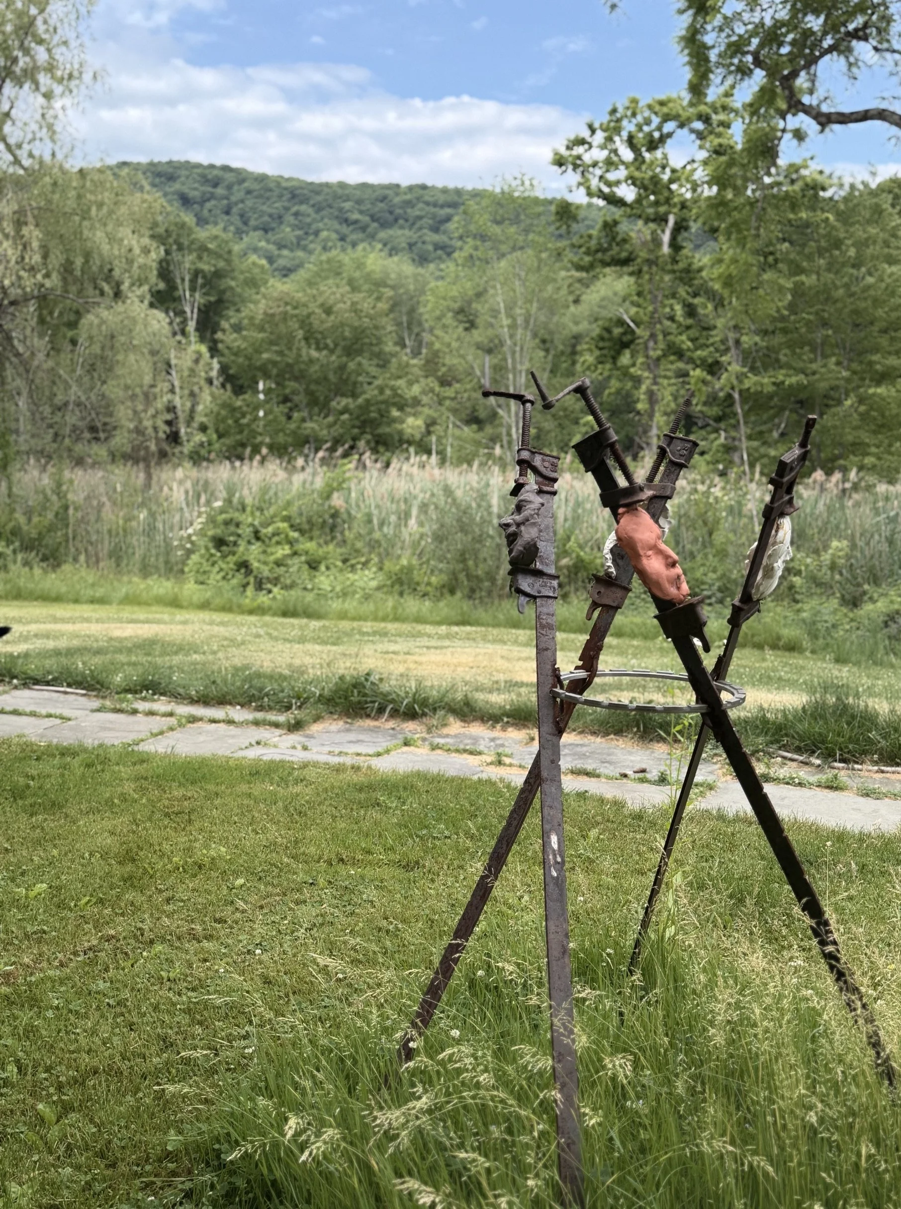 The Tribunal, outdoor sculpture by New York sculptor Aleksandra Scepanovic featuring reclaimed industrial steel and fired clay figures. Exterior