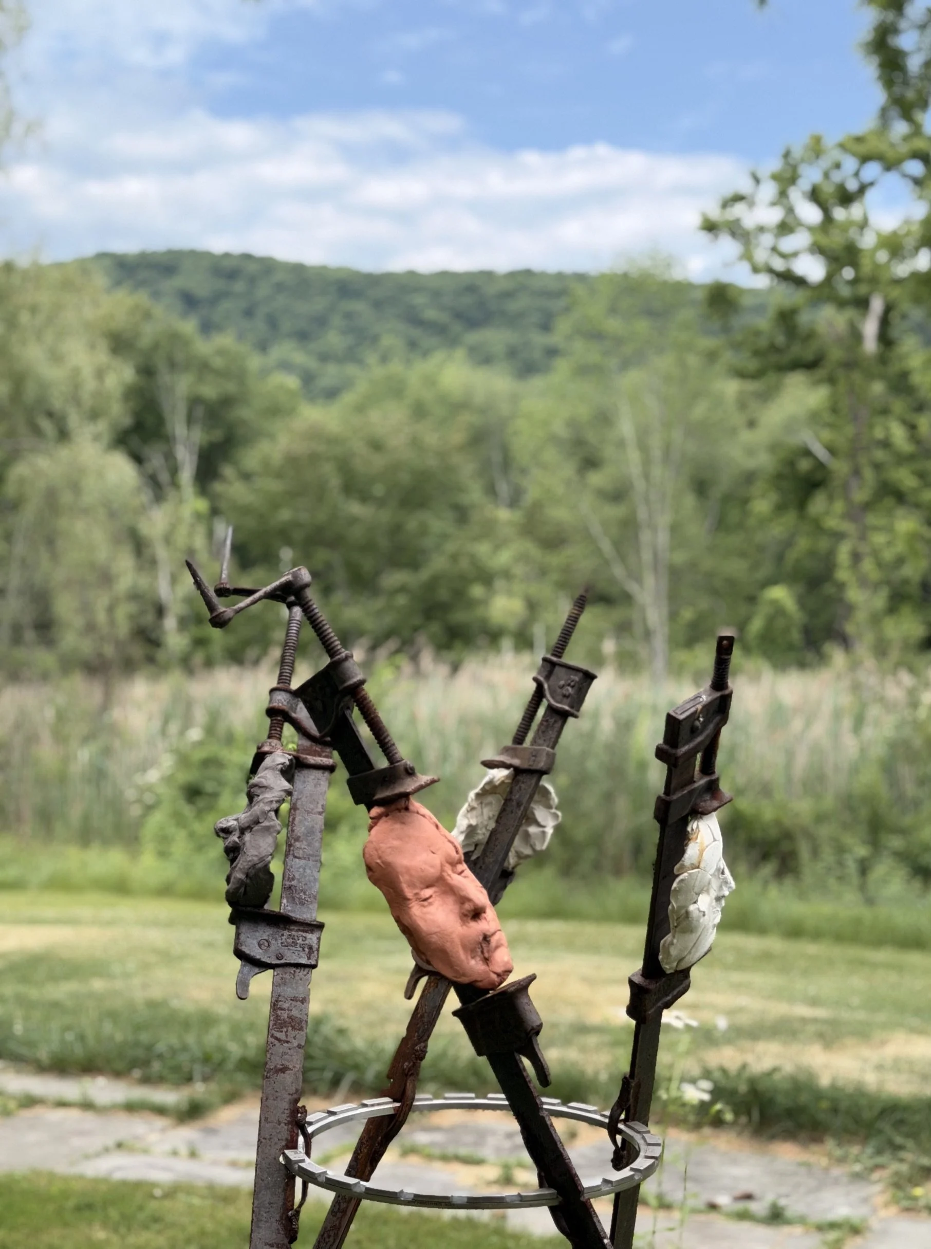 The Tribunal, outdoor sculpture by New York sculptor Aleksandra Scepanovic featuring reclaimed industrial steel and fired clay figures.