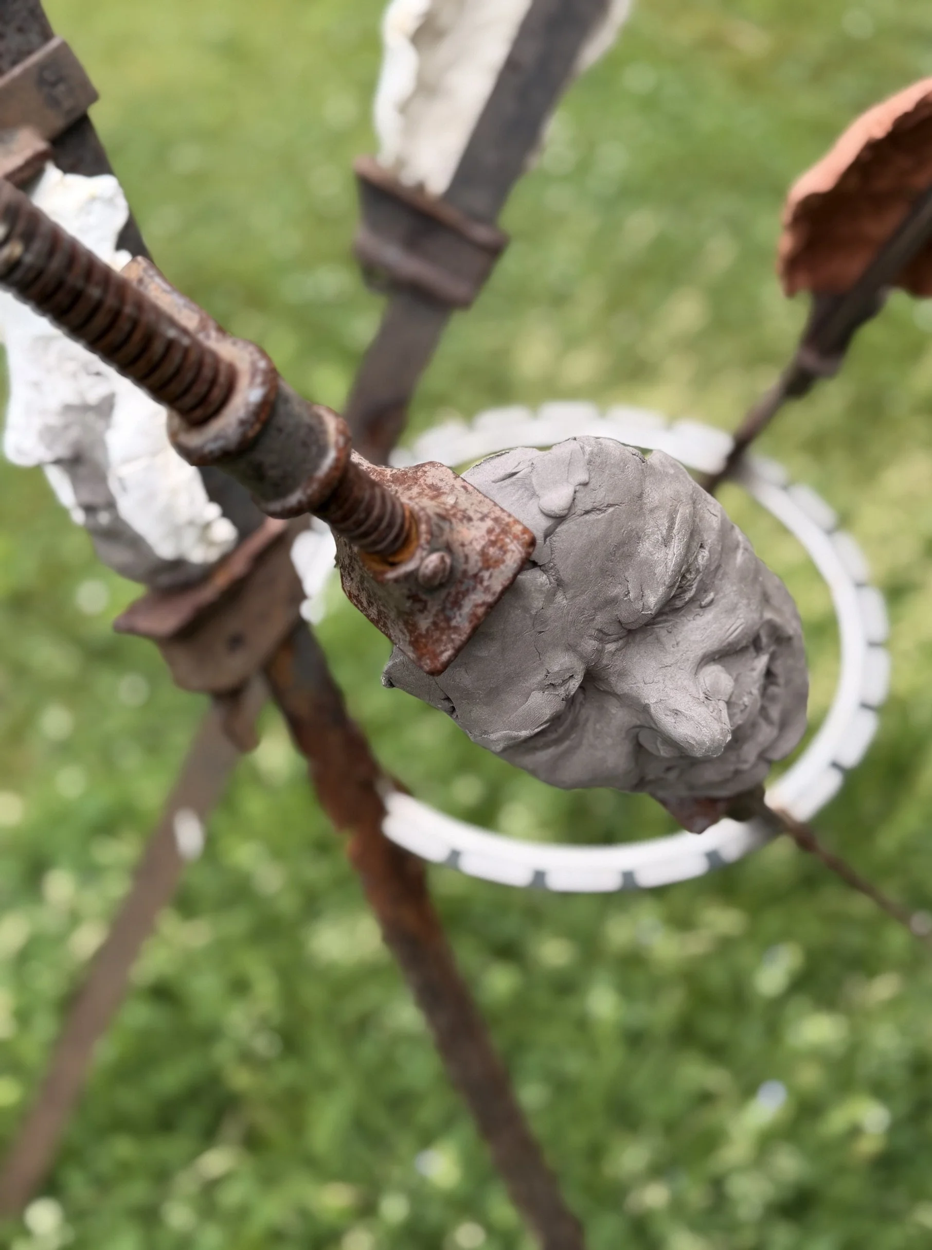 The Tribunal, outdoor sculpture by New York sculptor Aleksandra Scepanovic featuring reclaimed industrial steel and fired clay figures. View from above
