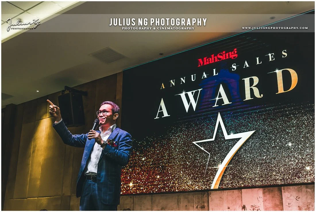 Mahsing CEO Mr Benjamin Ong on stage during Mah Sing Annual Sales Award ceremony, showcasing professional corporate event photography.
